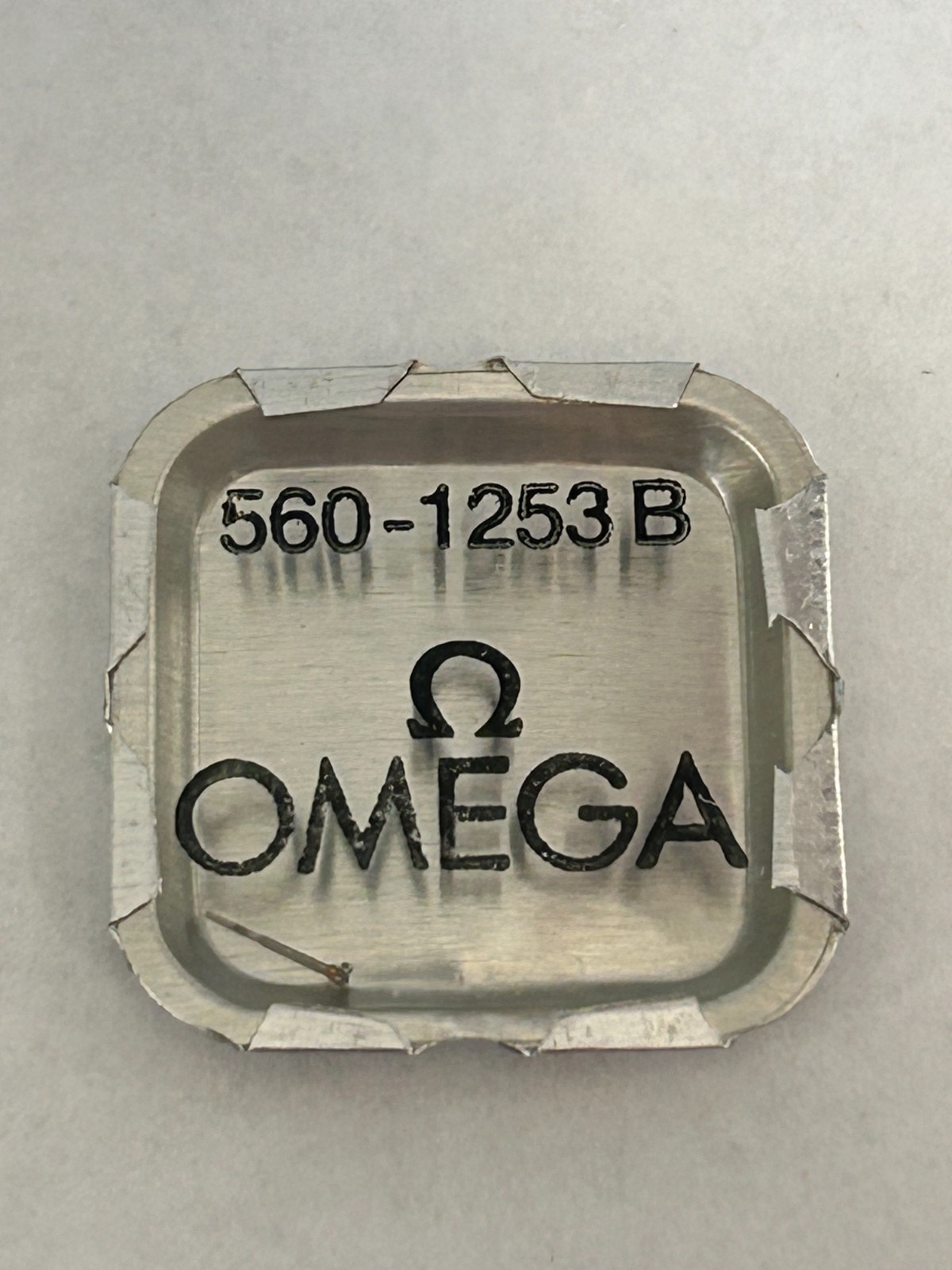 OMEGA 560-1253 B. Sweep Second Pinion. New Old Stock