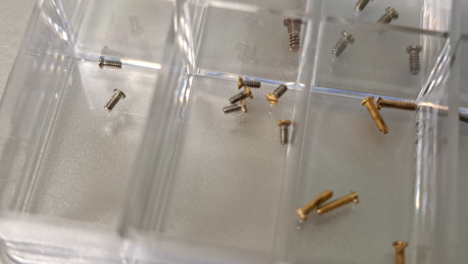 Unbranded miscellaneous watch case back screws. 1 box per order various sizes