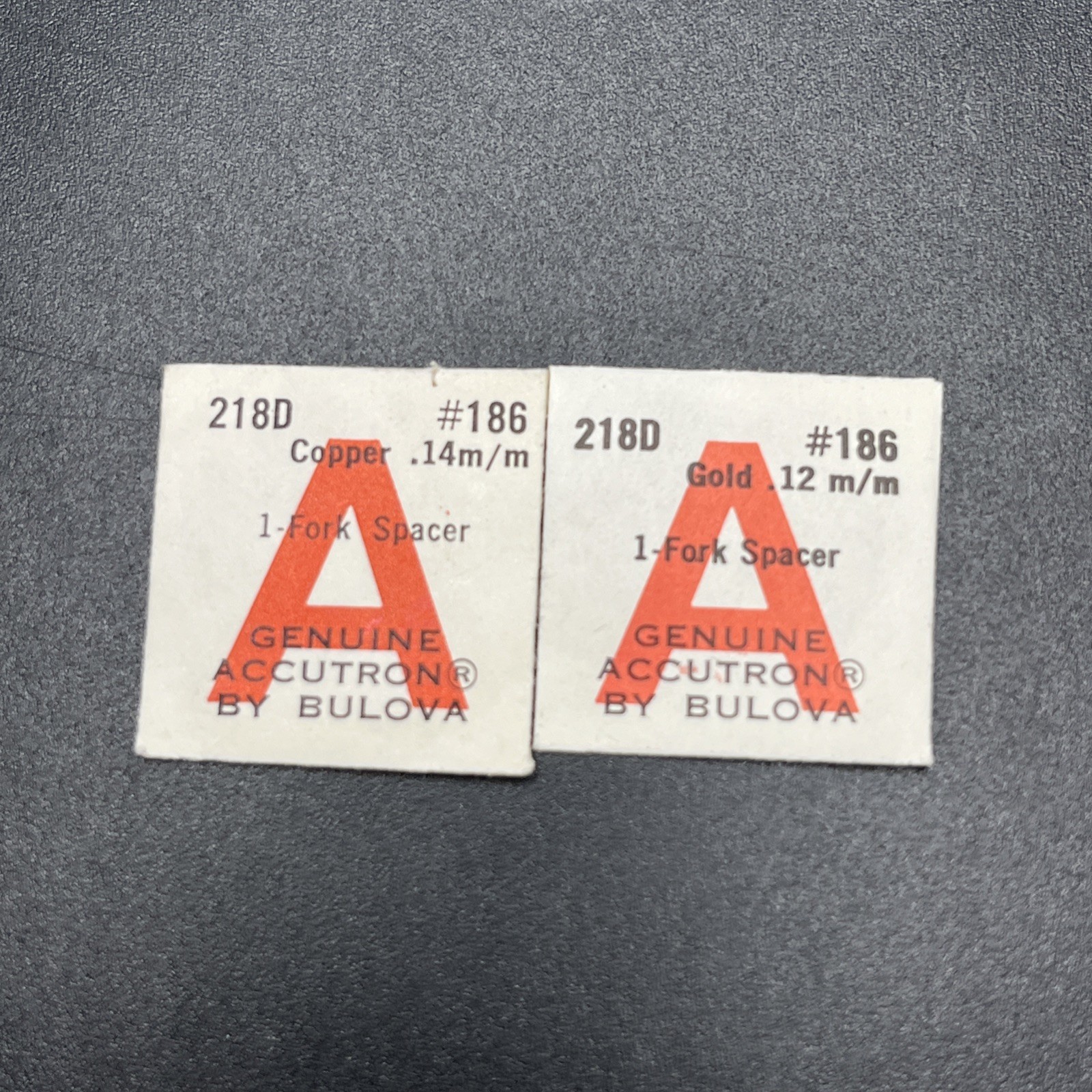 Two Accutron Cal. 218D Part 186 Copper / Gold Fork Spacers (010)