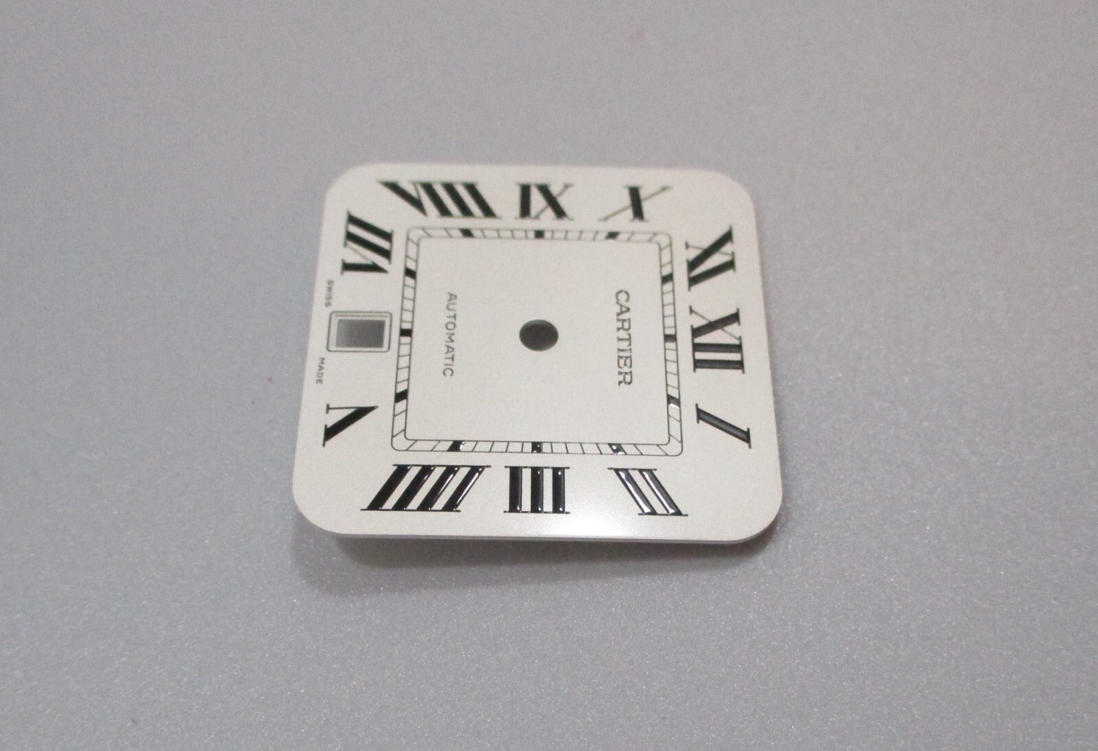 Cartier Santos White Dial Black Roman 40mm Men’s Automatic Steel Ref. WSSA0018?