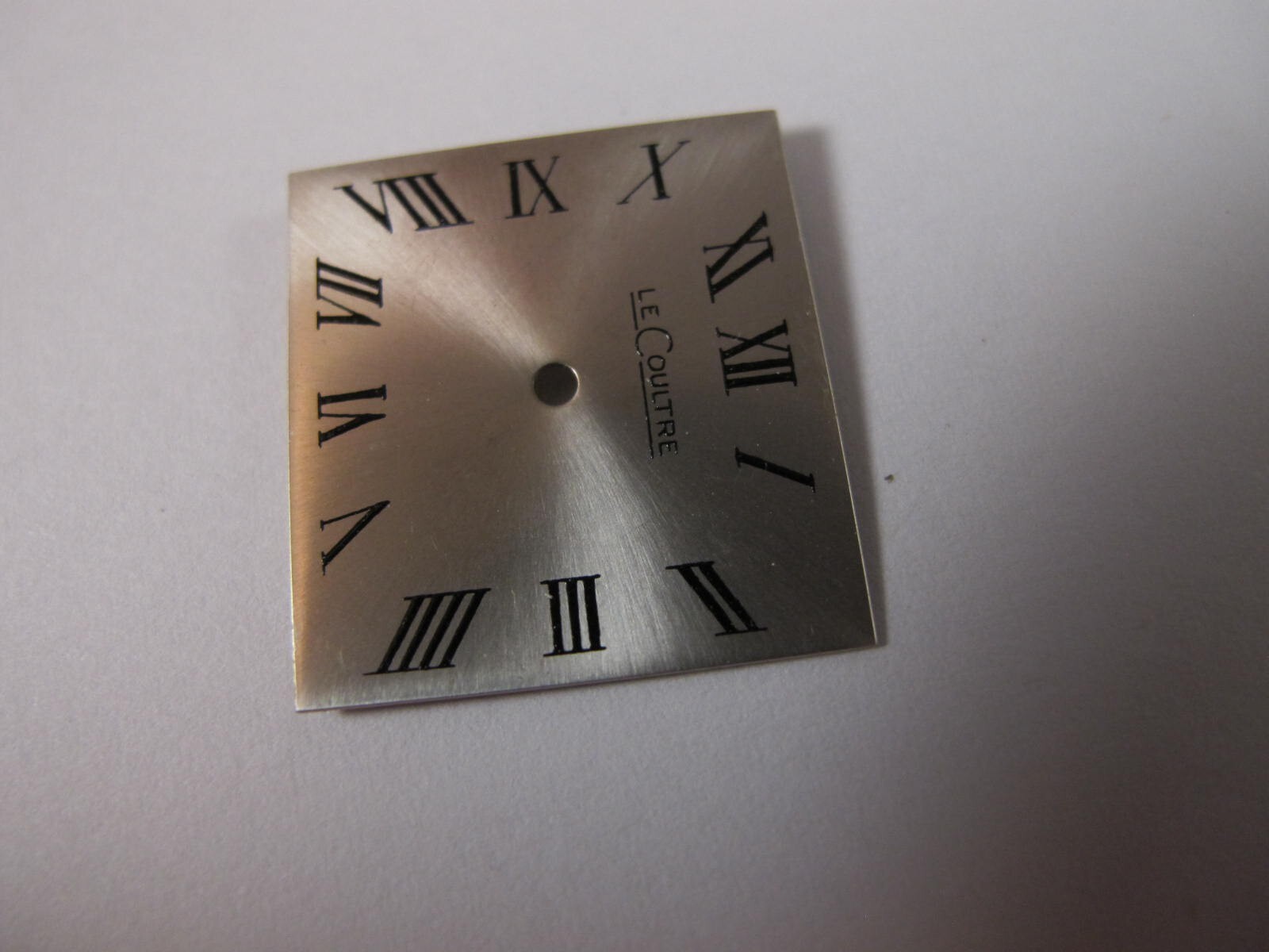LECOULTRE SILVER COLOR SQUARE DIAL WITH BLACK ROMAN NUMERALS OLD STOCK
