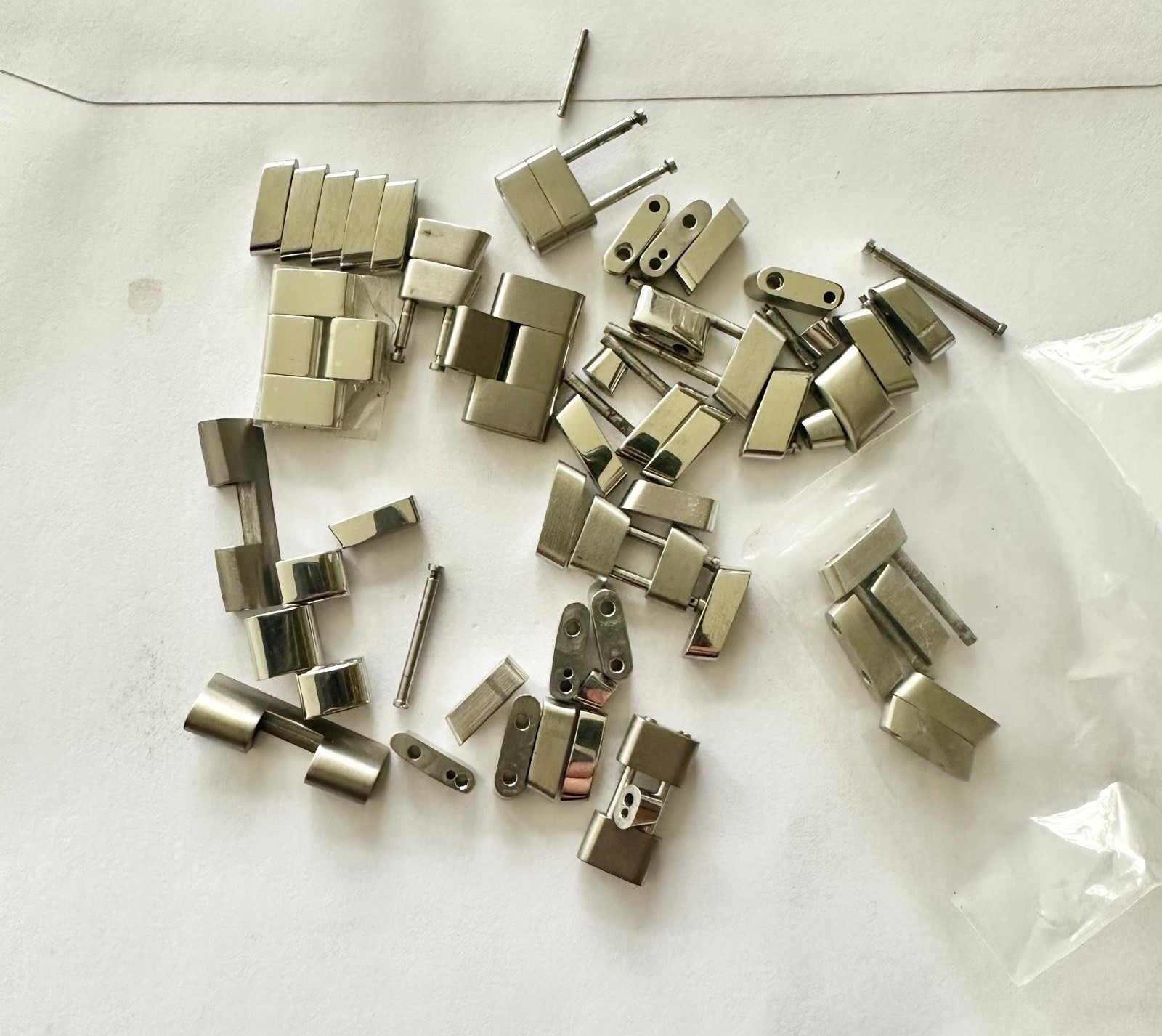 Breitling Stainless Steel and Titanium Wristwatch Bracelet Links, end links.
