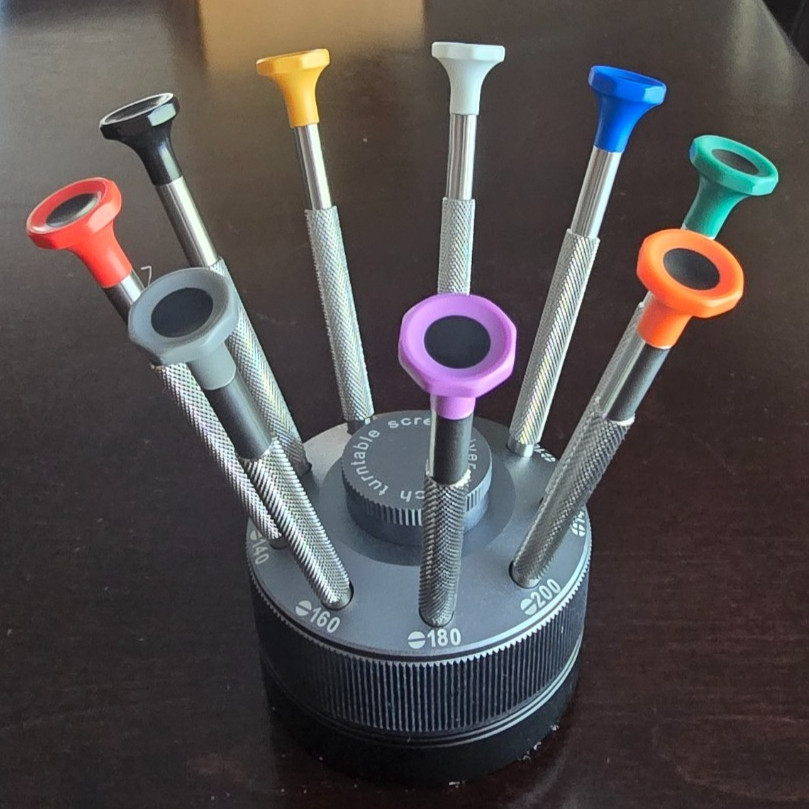 HIGH QUALITY STAINLESS STEEL 9 PIECE WATCHMAKERS SCREWDRIVER SET ROTATING STAND