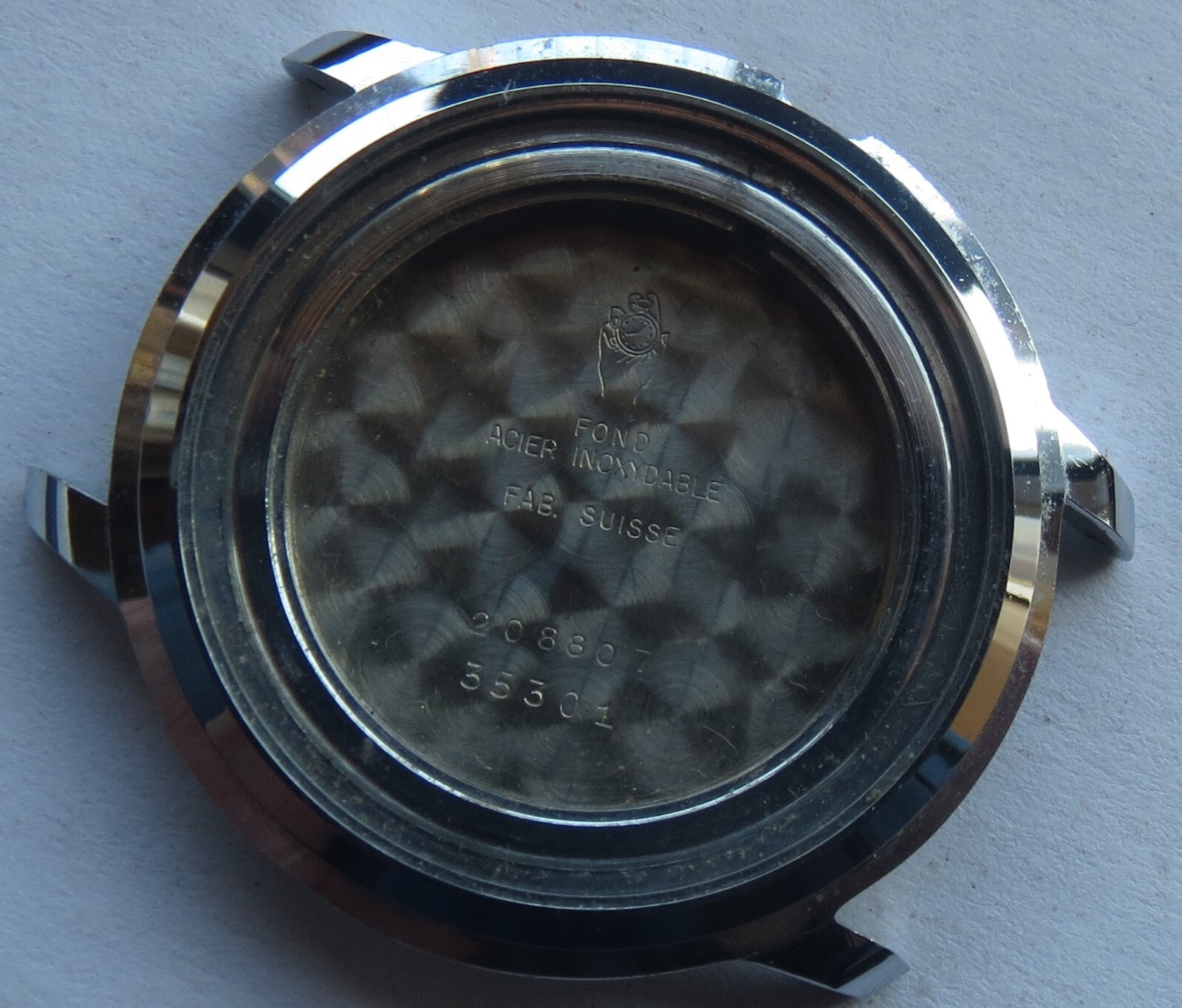 Movado mens wristwatch nickel chromiun case 35 mm. in diameter N.O.S