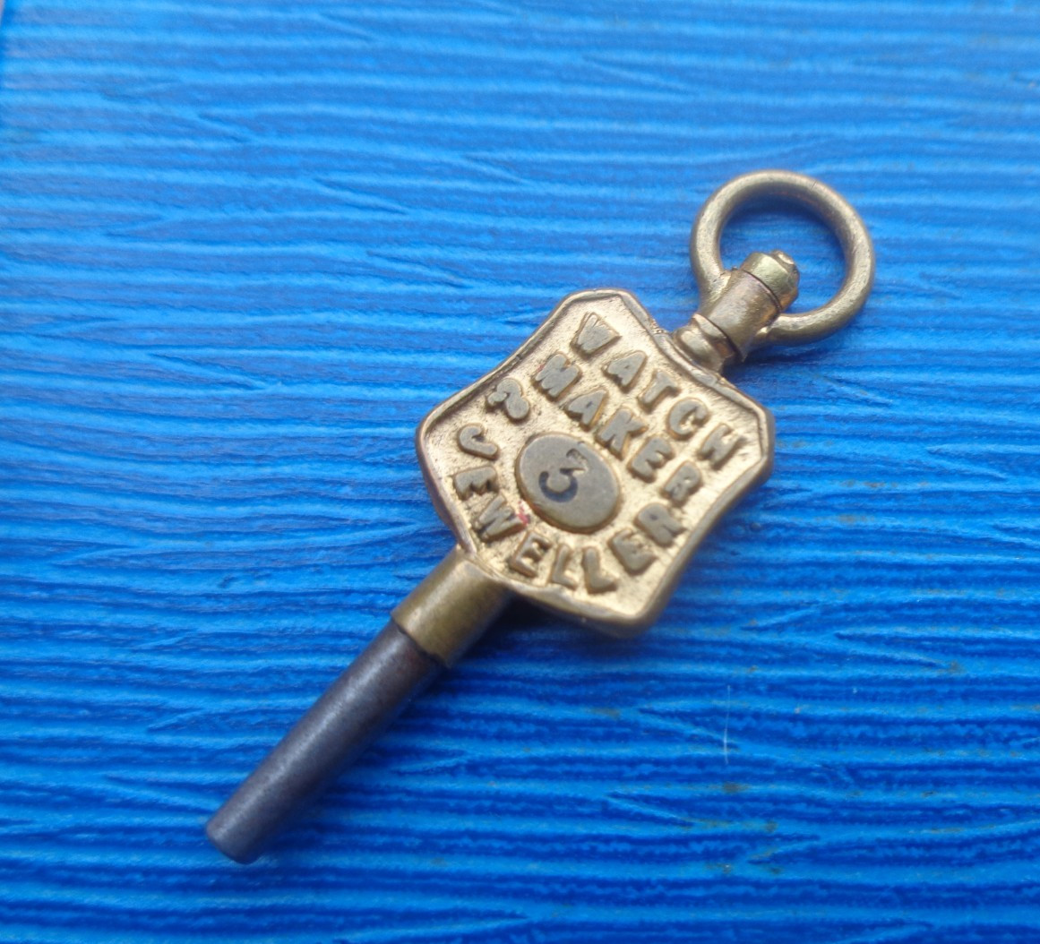 Advertising Pocket Watch Key John E Fattorini , Bradford , Yorkshire number 3