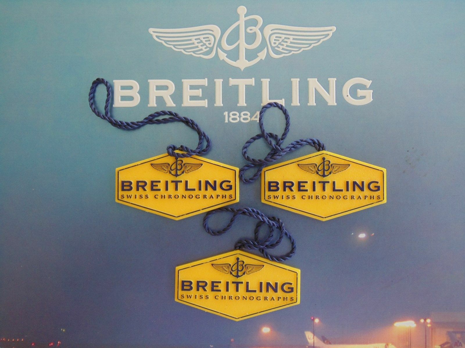 BREITLING FACTORY JEWELERS SALES ACCESSORY YELLOW PLASTIC WATCH HANG / SWING TAG
