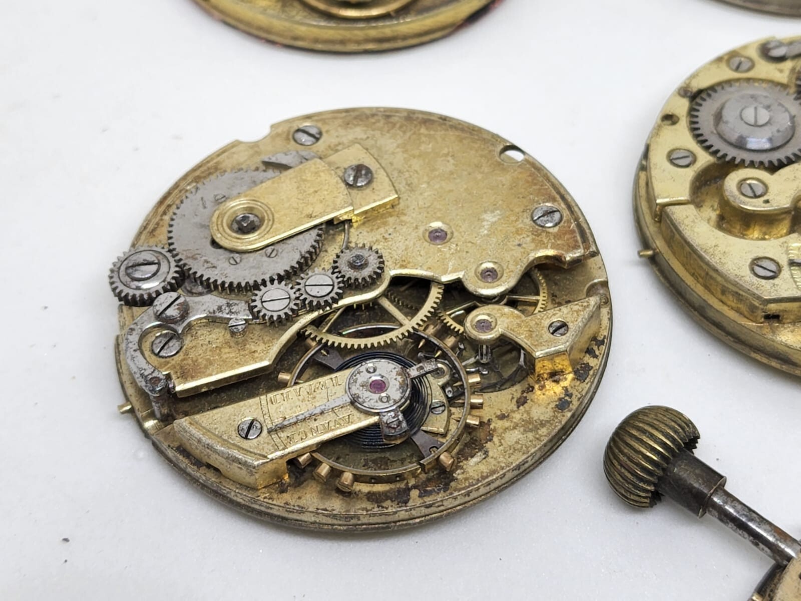 Lot of 6 high end pocket watch movements – Sold for parts – AS IS