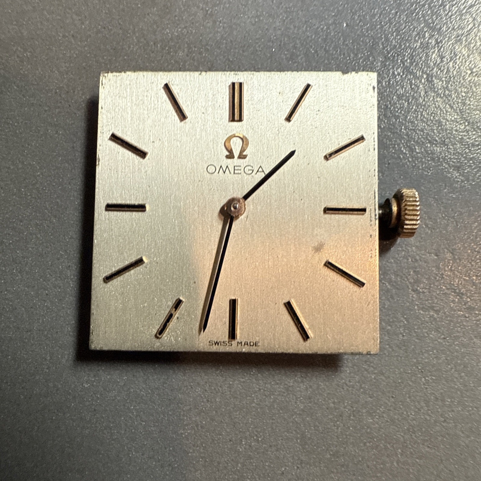 vintage manual-wind Omega square watch dial and movement (Hands Function)
