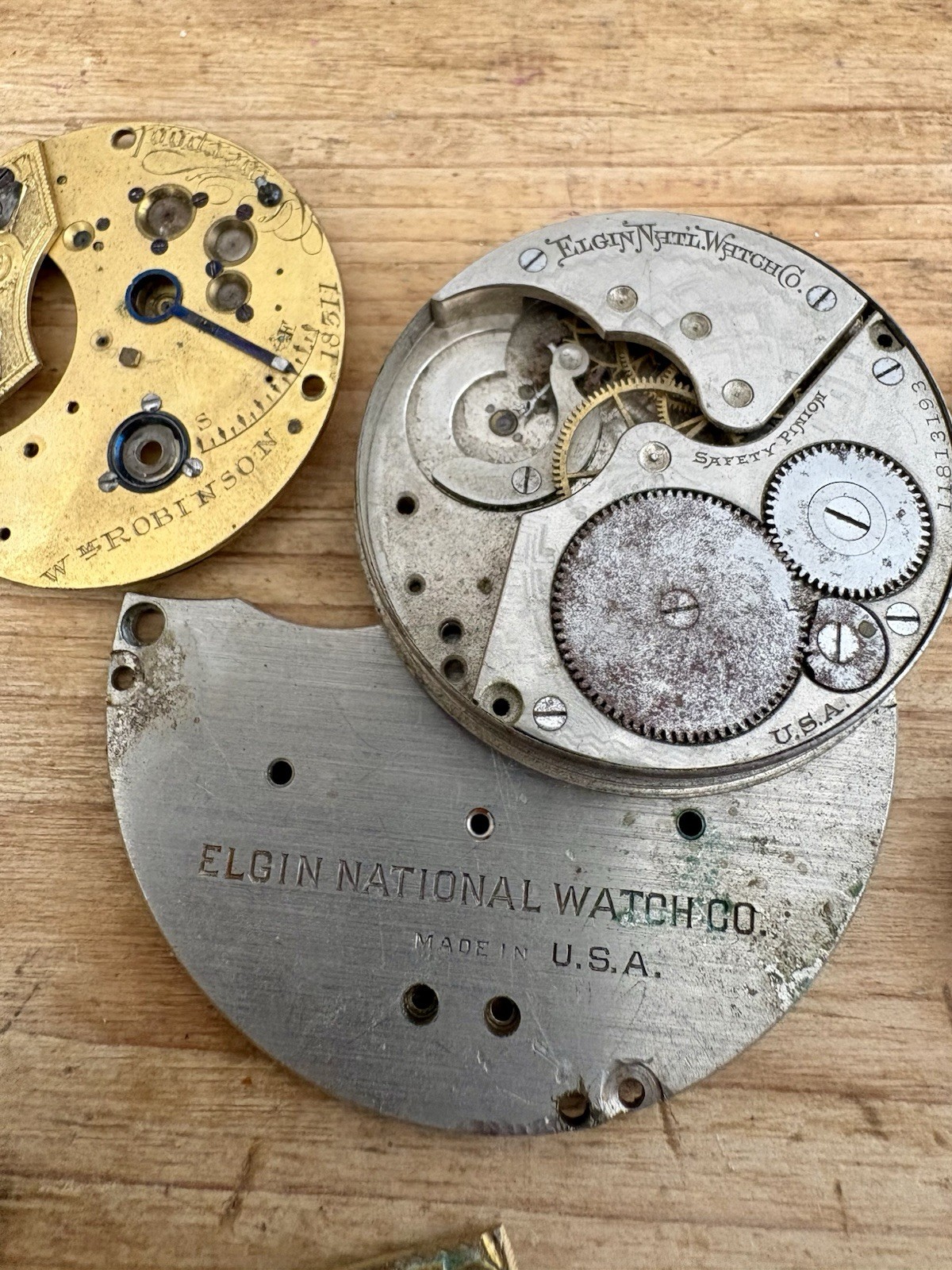 Watchmaker parts Lot w/ Box Movements Dials Gears Bulova Omega Benrus Elgin