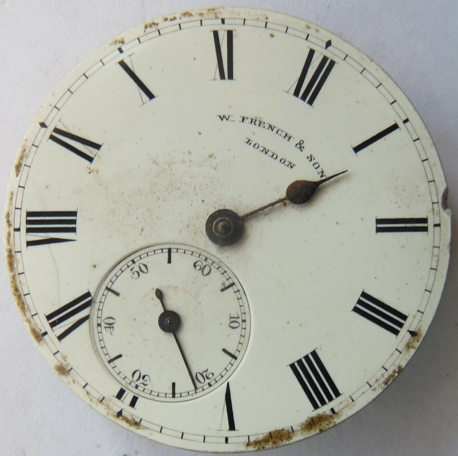 W. French & Son Pocket Watch movement & enamel dial key wind balance Ok.