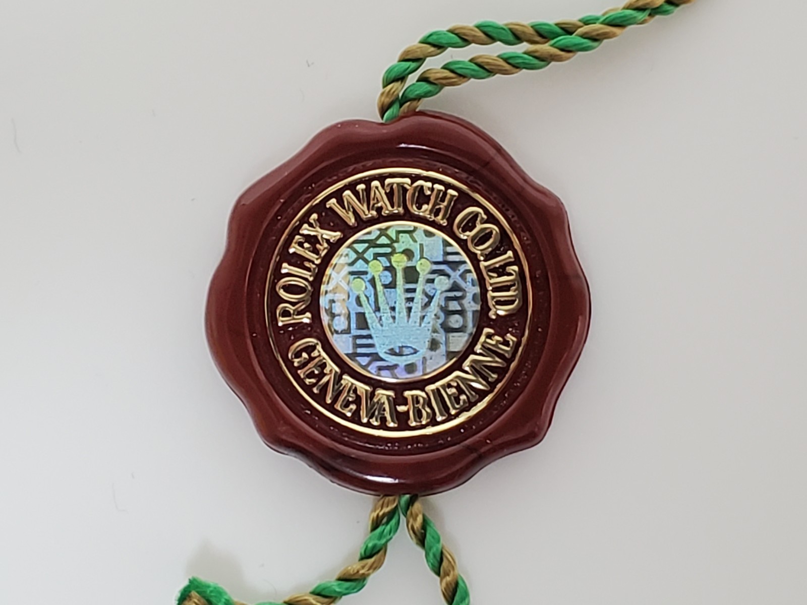 AUTHENTIC ROLEX SINGLE CROWN HOLOGRAM HANG TAG RED 1989 – 2000