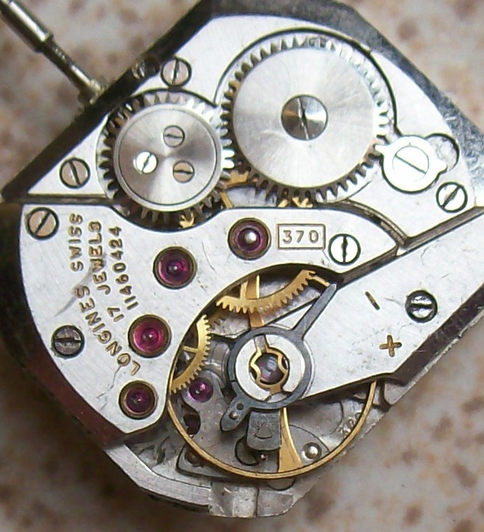 Vintage Longines Cal 370 wristwatch movement 23 mm. x 20 mm. aside