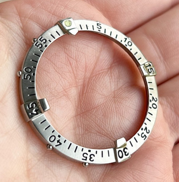 A Genuine Breitling Colt / Superocean Stainless Steel Wristwatch Bezel.