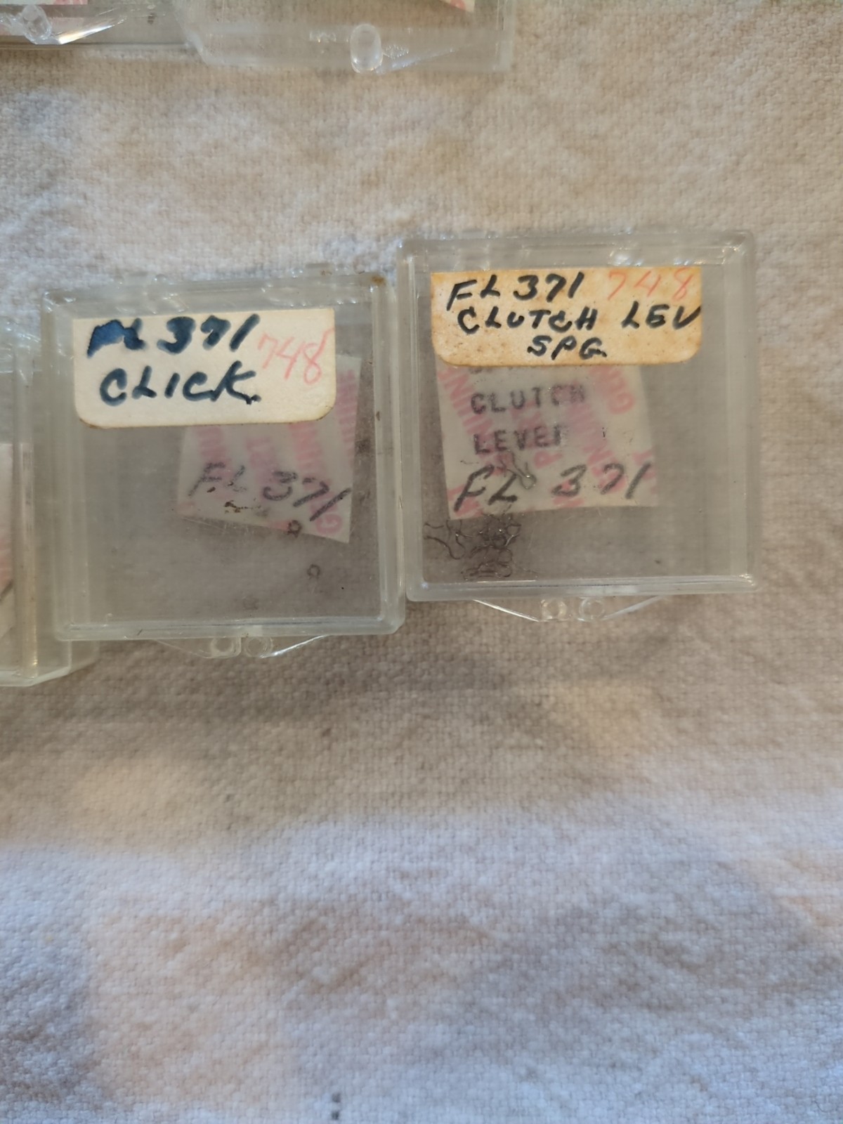 17 Boxes of Elgin 748 Movement Unused Jewels, Screws, Wheels, Regulators Etc…!