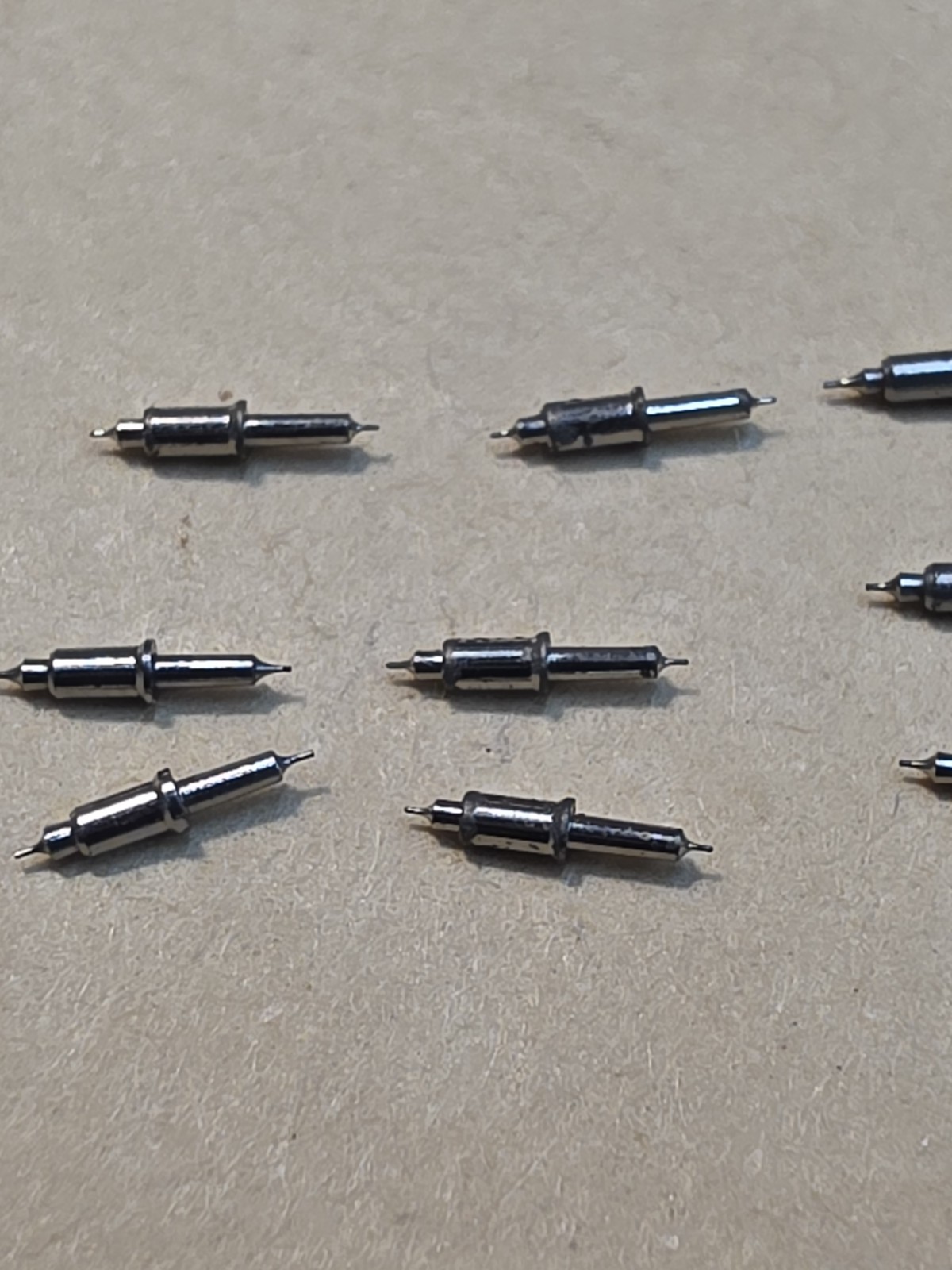 Lot Of 9 NOS Waltham 16s Model 99 Vanguard 4861 Tapered Hub Balance Staffs Parts