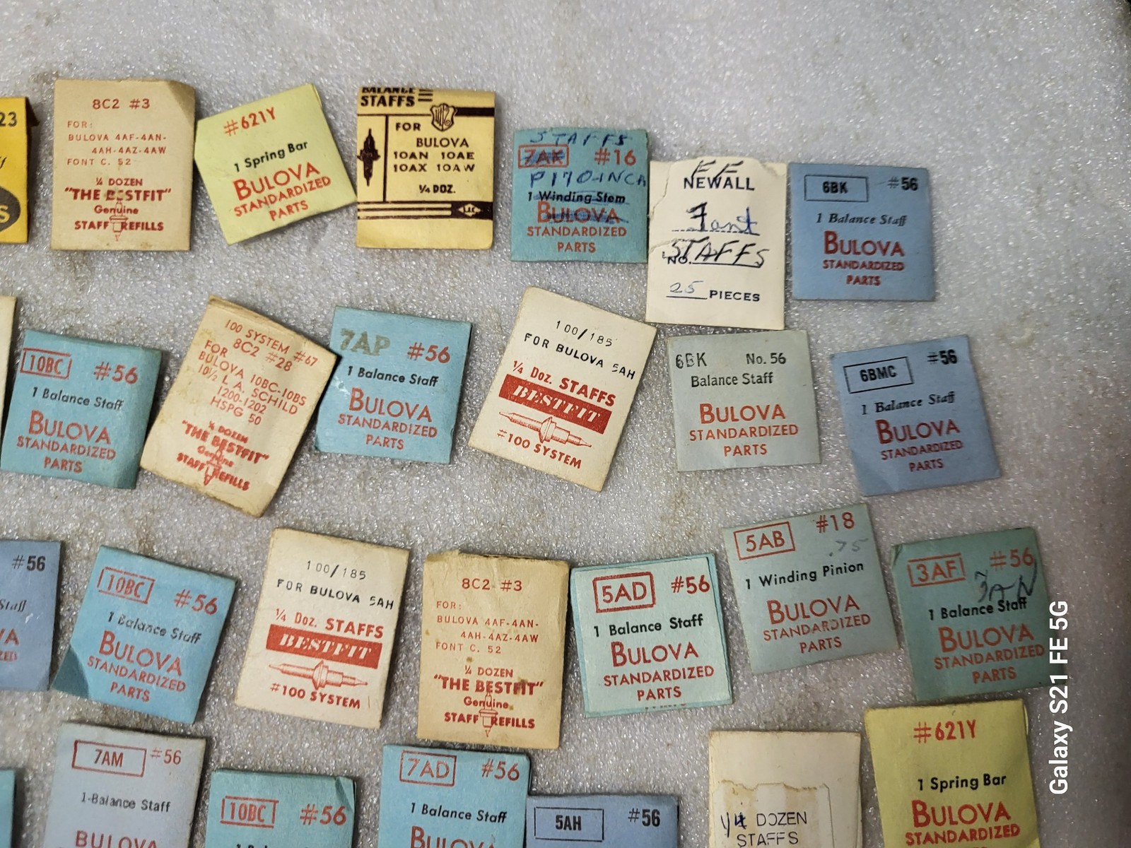 Lot of 58 Packages of Bulova Crown Staff & Balance Wheel Watch Repair Parts