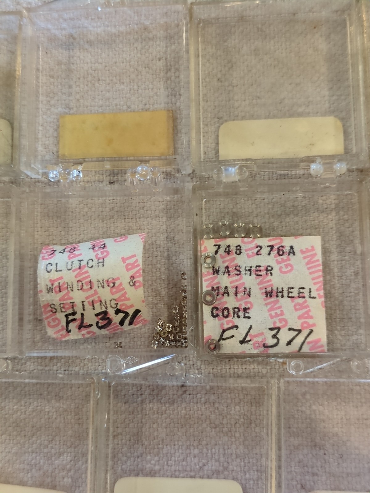 17 Boxes of Elgin 748 Movement Unused Jewels, Screws, Wheels, Regulators Etc…!
