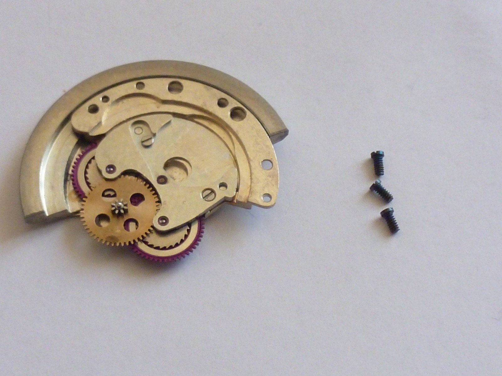 GENUINE Authentic Rolex Rotor + bridge 1560 perfect condition completely screw