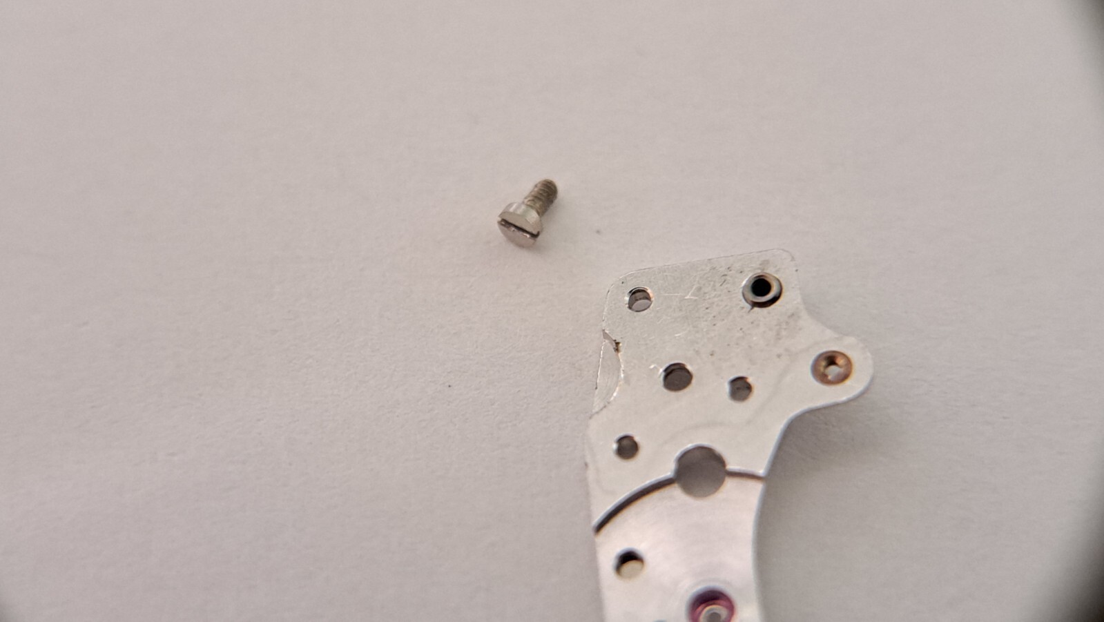 Lecoultre 916 mainplate bridge and screw pre-o for watch repair/parts