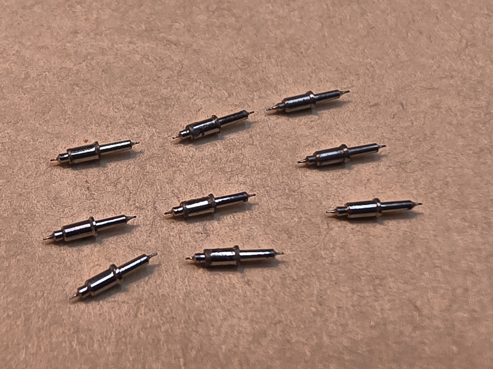 Lot Of 9 NOS Waltham 16s Model 99 Vanguard 4861 Tapered Hub Balance Staffs Parts