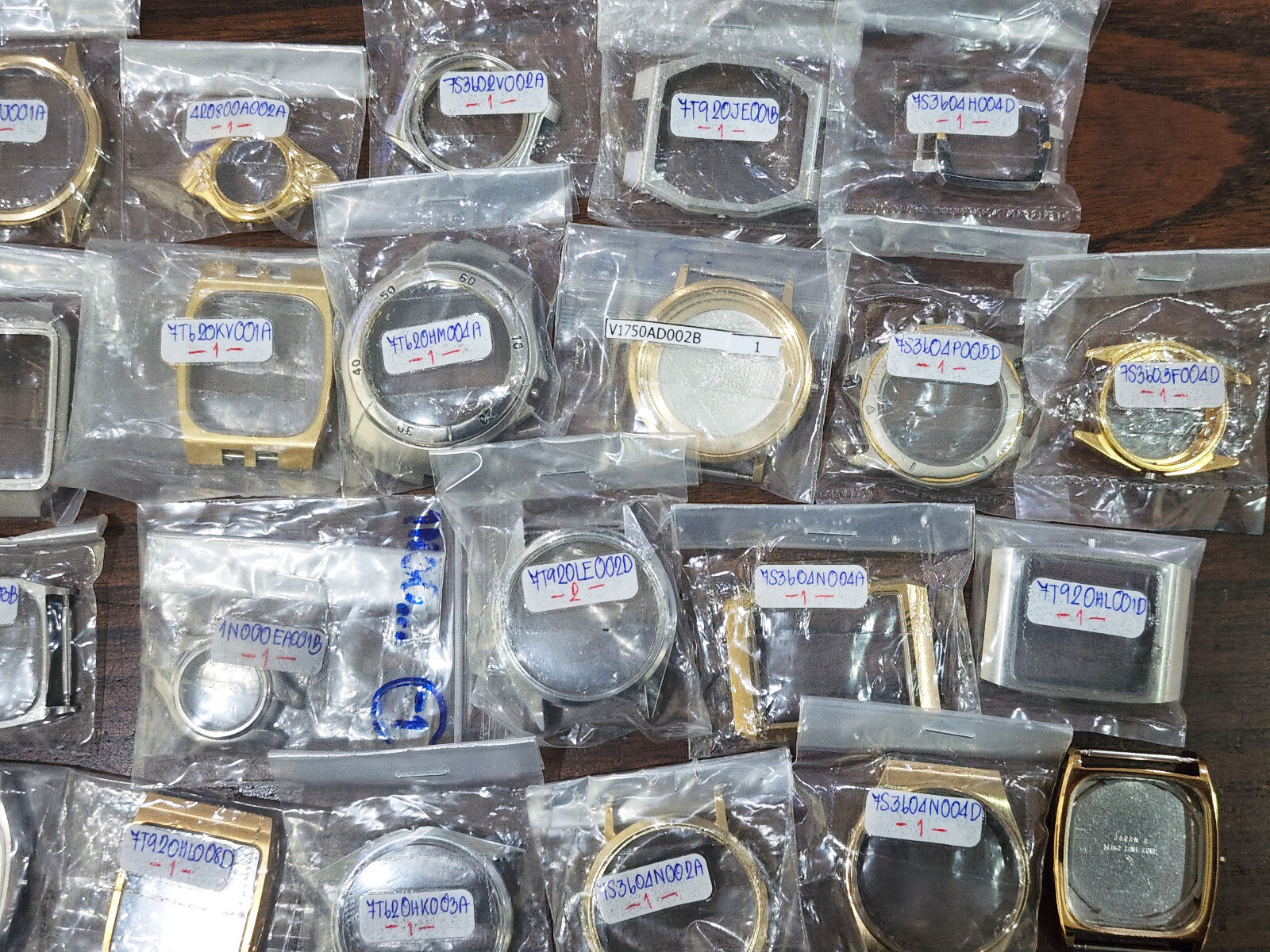 Hugh Lot 35 NOS Case Seiko watch Dress 7T62 Quartz Assorted parts Etc.