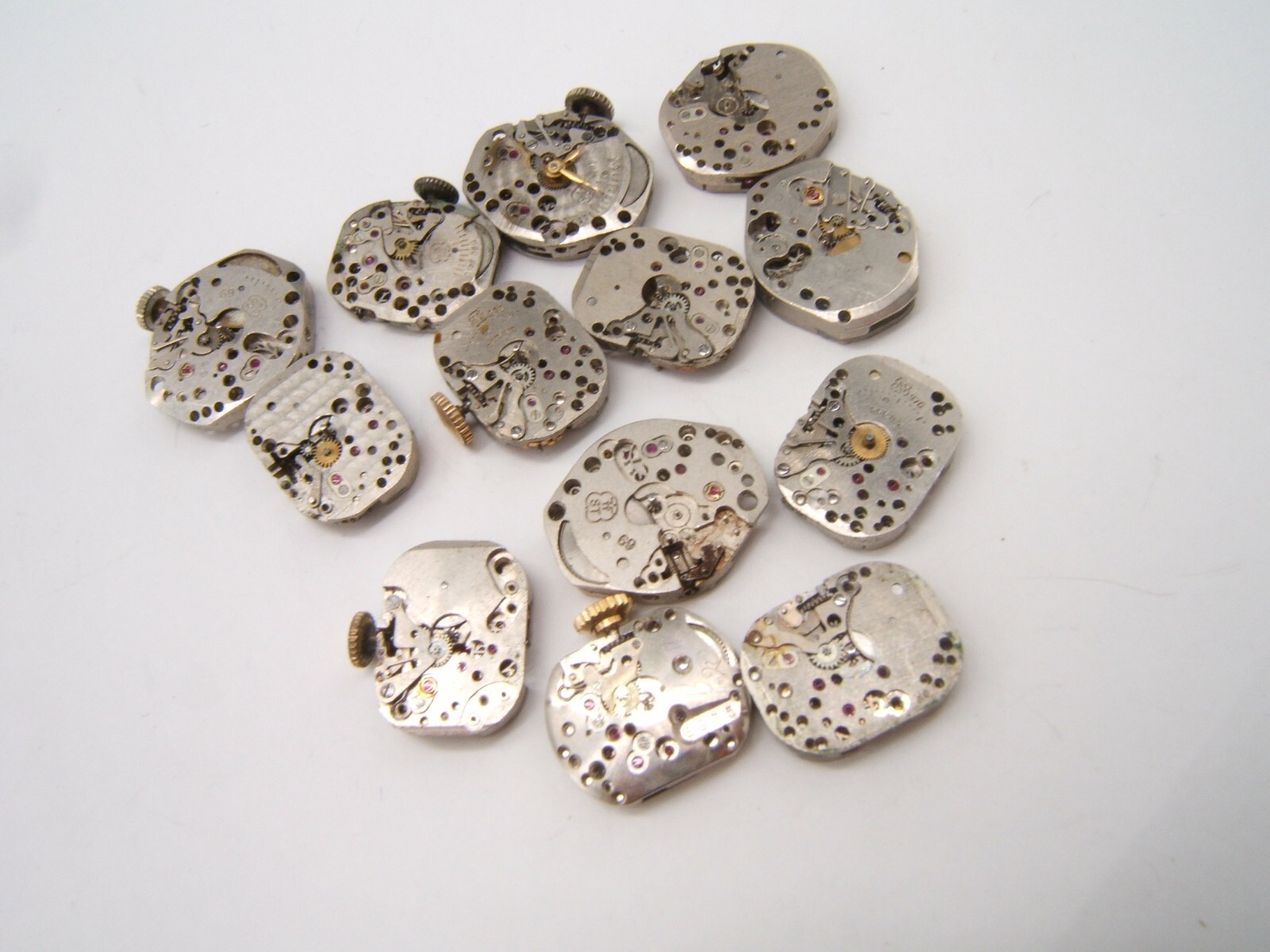 13 SMALL WOMEN’S WATCH MOVEMENTS PARTS REPAIR MECHANICAL WIND UP (LOT BC)