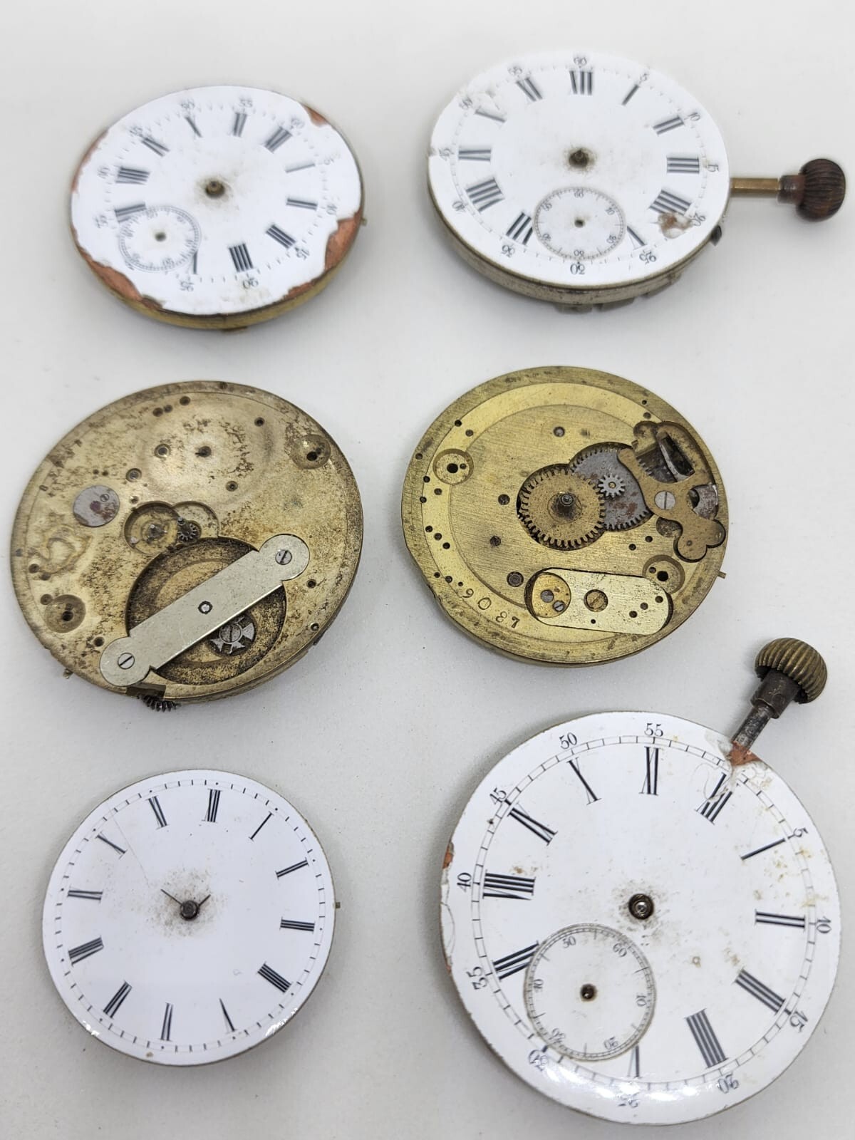 Lot of 6 high end pocket watch movements – Sold for parts – AS IS