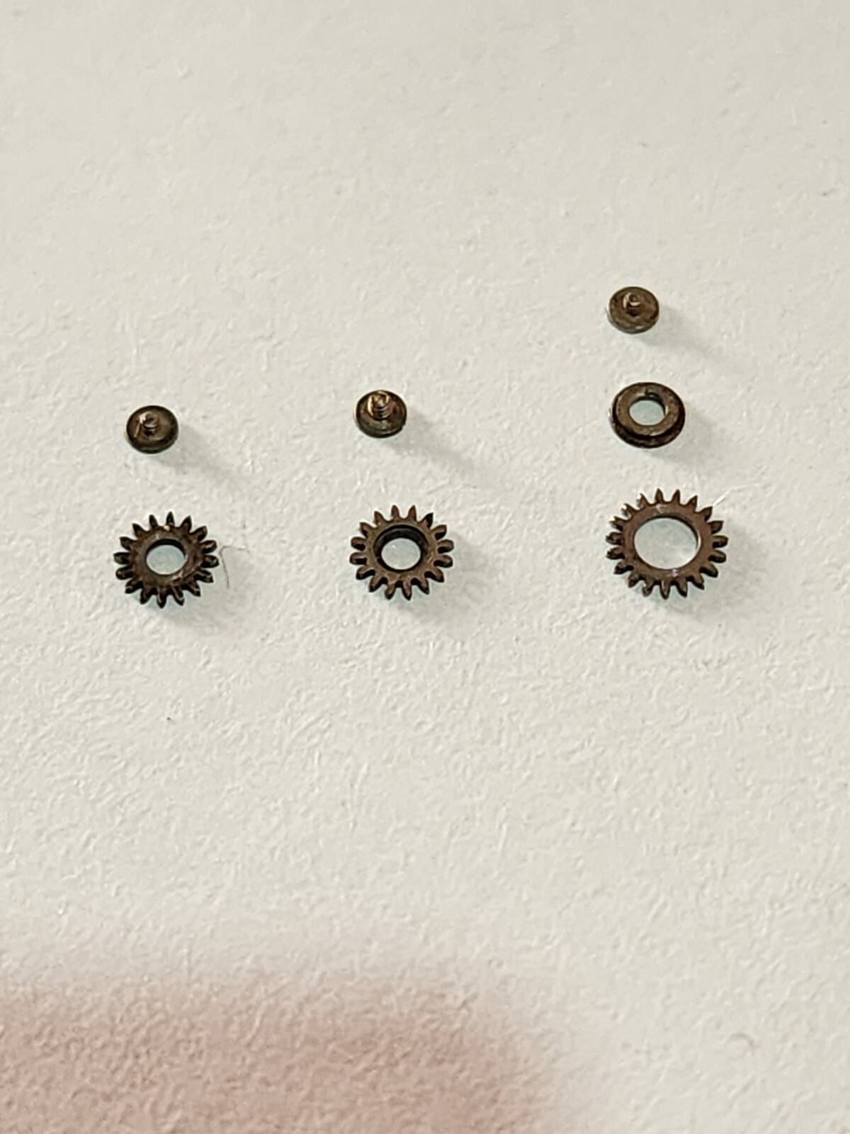 Crown Wheels set of CYMA Cal R.486. Used. Good working condition.