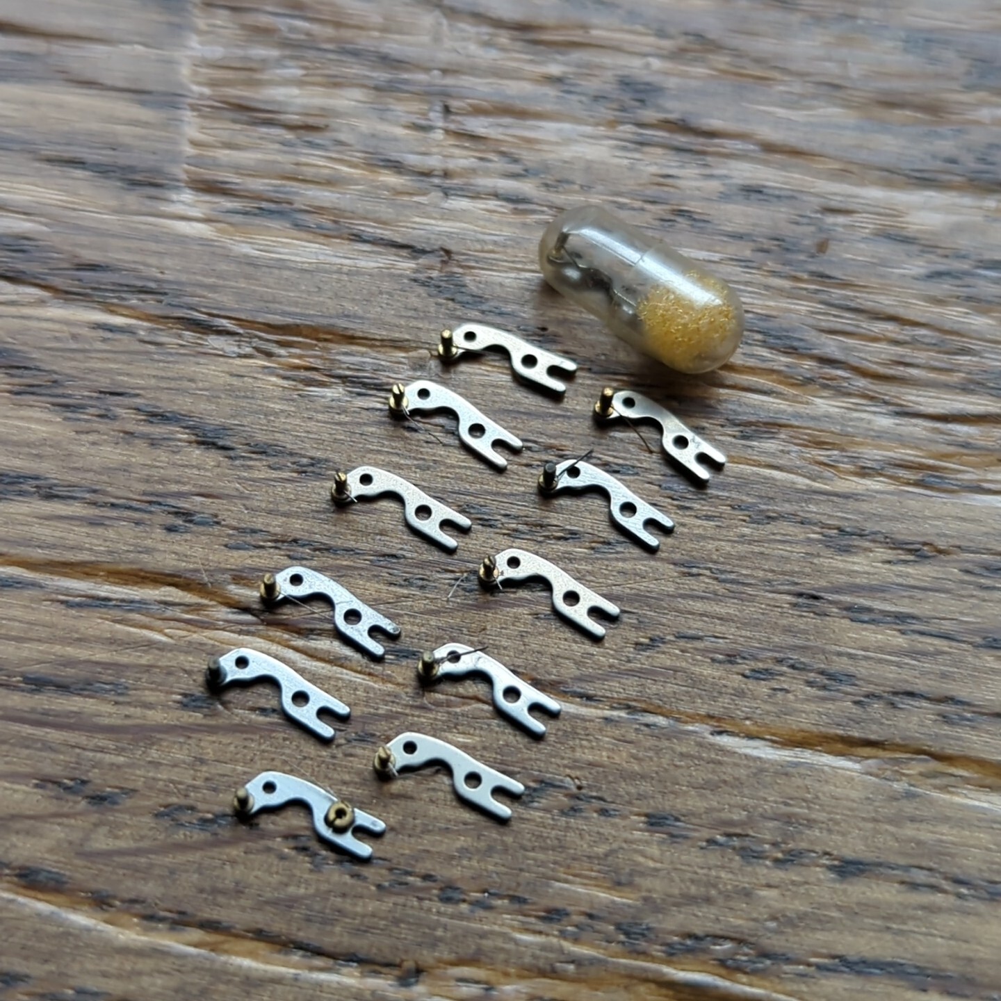 Bulova Accutron 214 Lot of 12 Used Pawl Bridge Assembly Parts (S214)