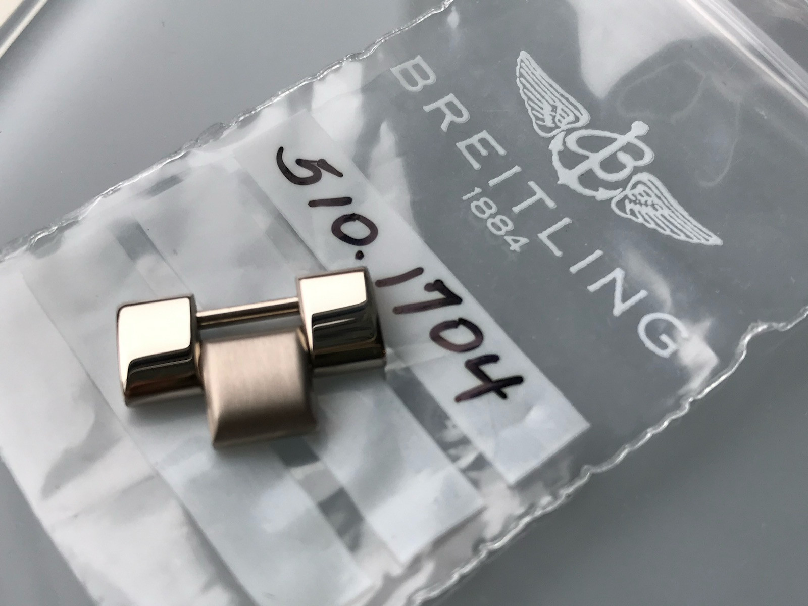 Breitling 18kt White Gold Link – SuperOcean J10040 261J & Emergency J57321 862J