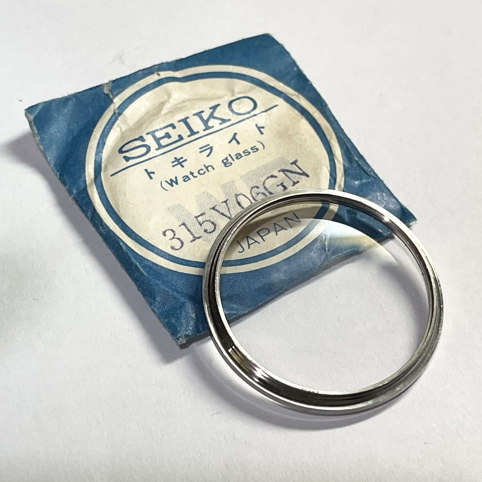 NOS GENUINE GLASS CRYSTAL SEIKO 5606-9030 5606-9040 LM Lord Matic 315V06GN