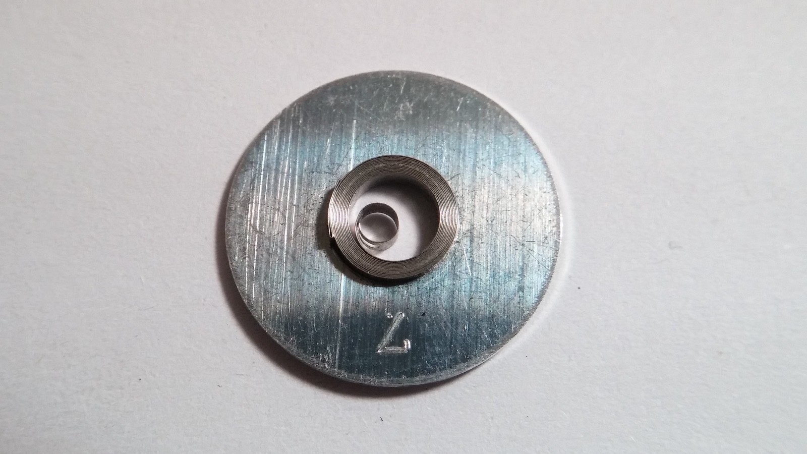 FHF cal 69 mainspring NEW. coil approx 7mm diameter auto-graisse