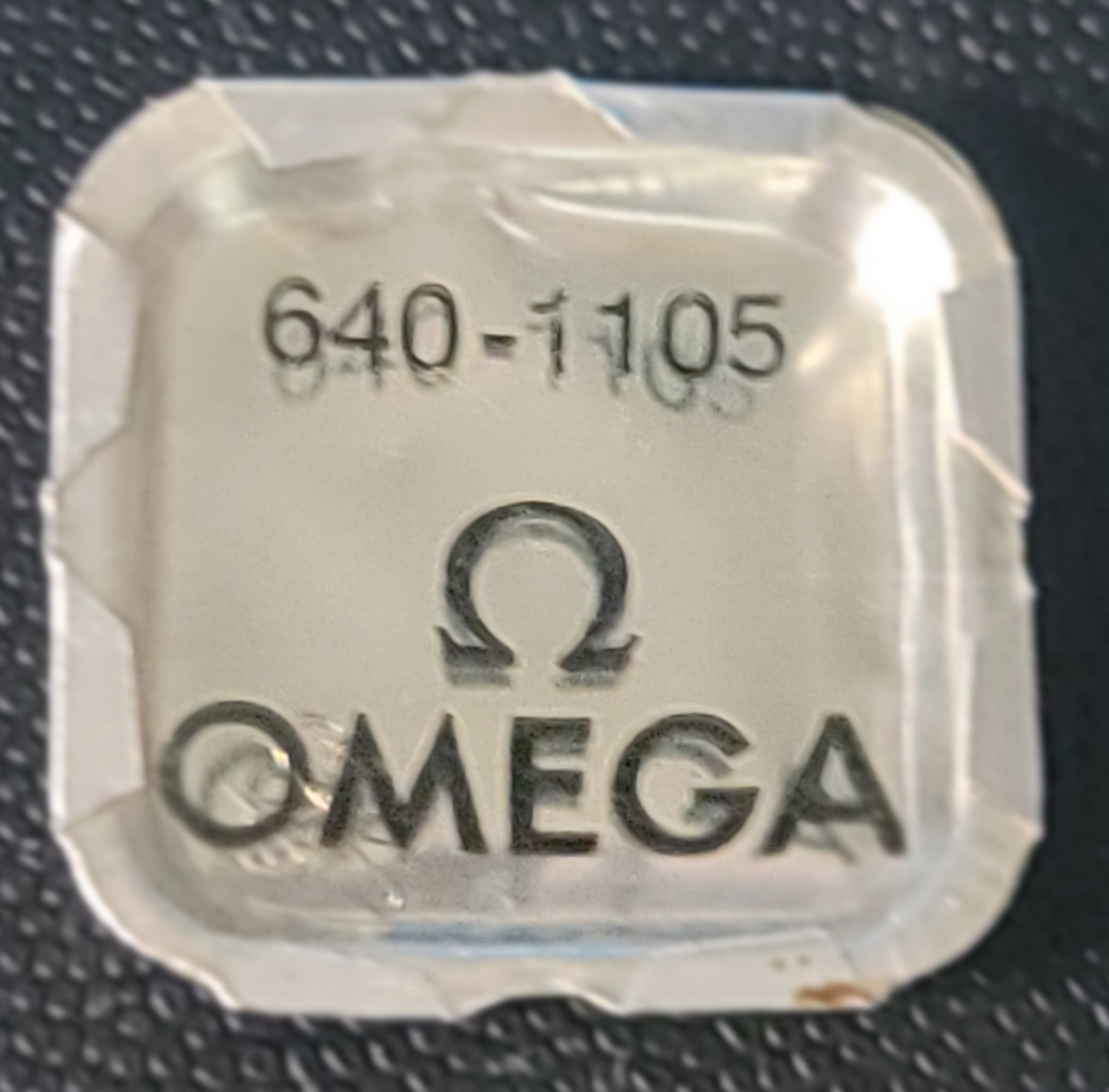 SB5-02: Omega 640-1105 Click Spring NOS Genuine Part for Cal 640 Series