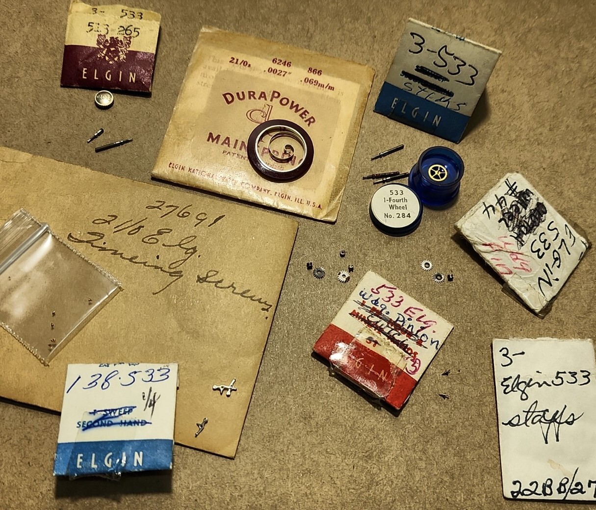 Lot Of NOS Elgin 21/0 Parts-Crown, Stems, Balance Staffs, Winding Pinions, etc