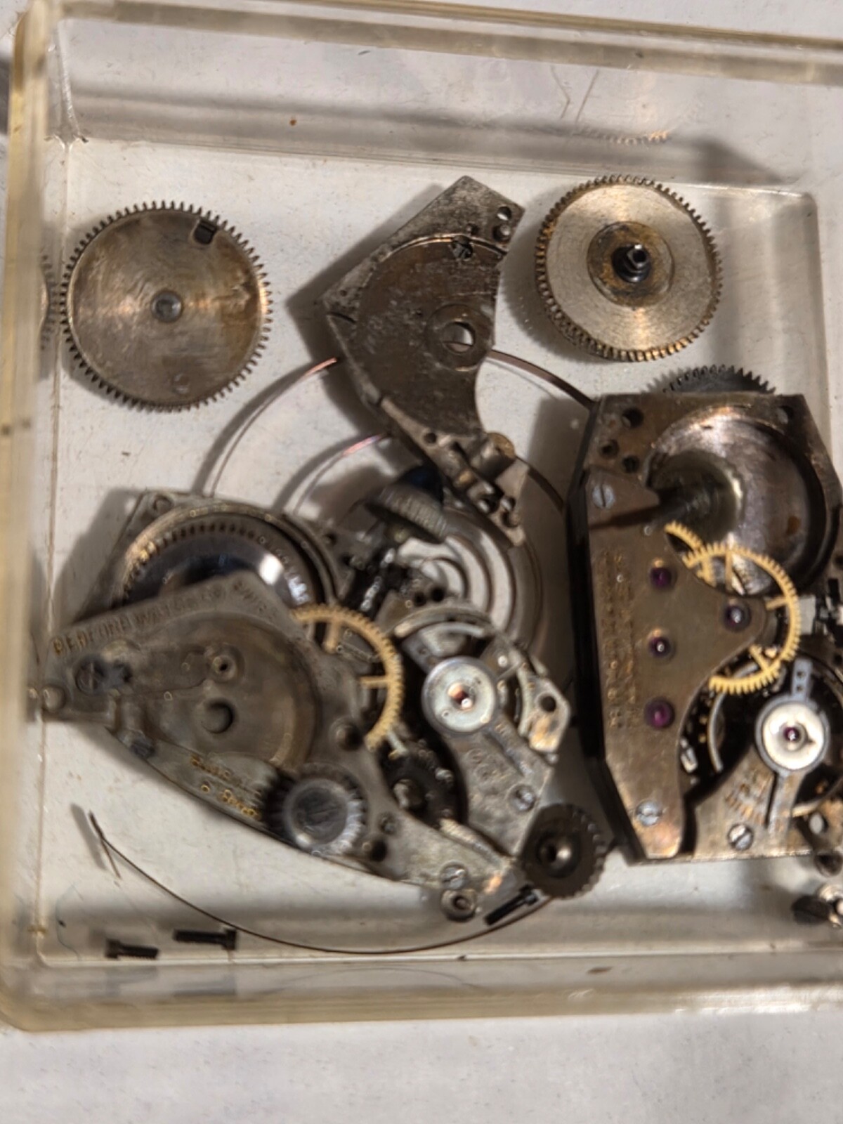 Two (2) A.Michel 640 movements. Partially disassembled, with parts.