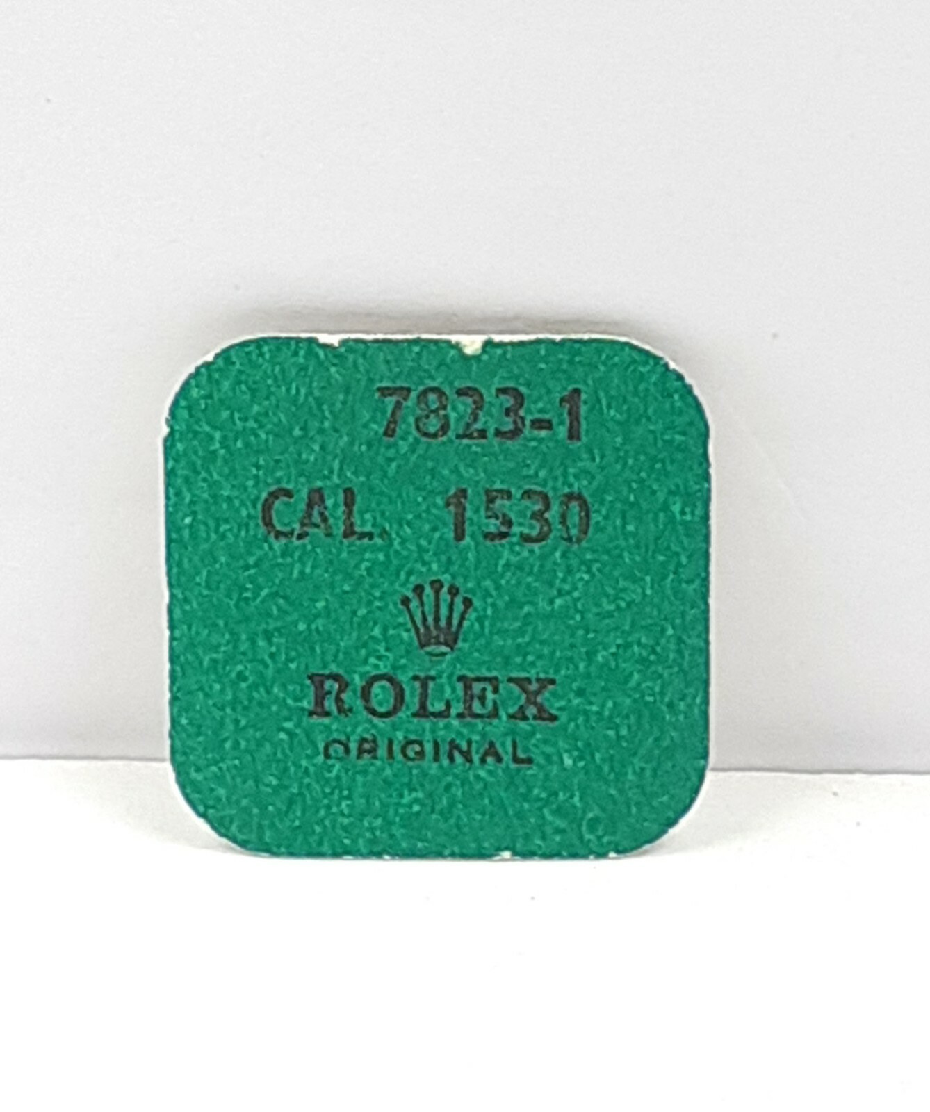 Original Rolex Part No 7823-1 Cal 1530 Foot For Train Wheel Bridge. NOS Sealed