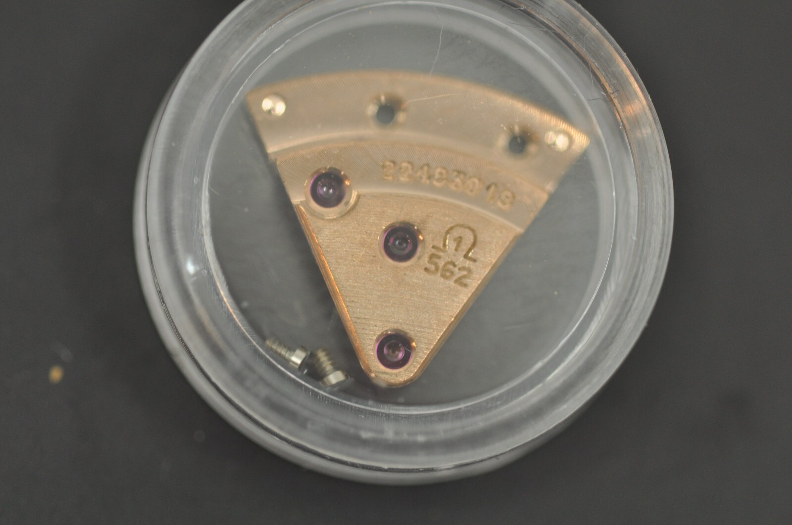 Omega watch part 562-1003 train wheel bridge used nice