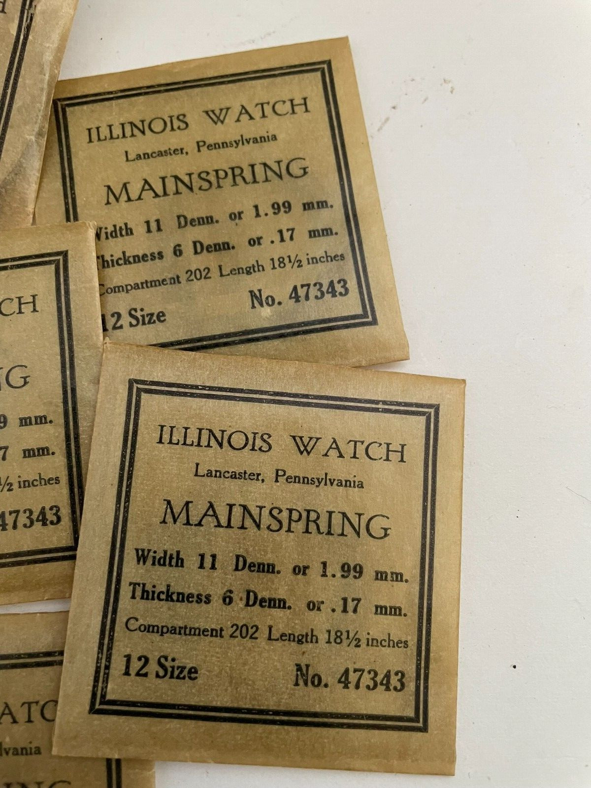 Collection of 11 Illinois Watch Mainsprings of various sizes