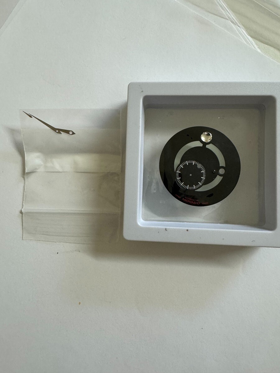 Movado red label museum calendomatic dial and hands