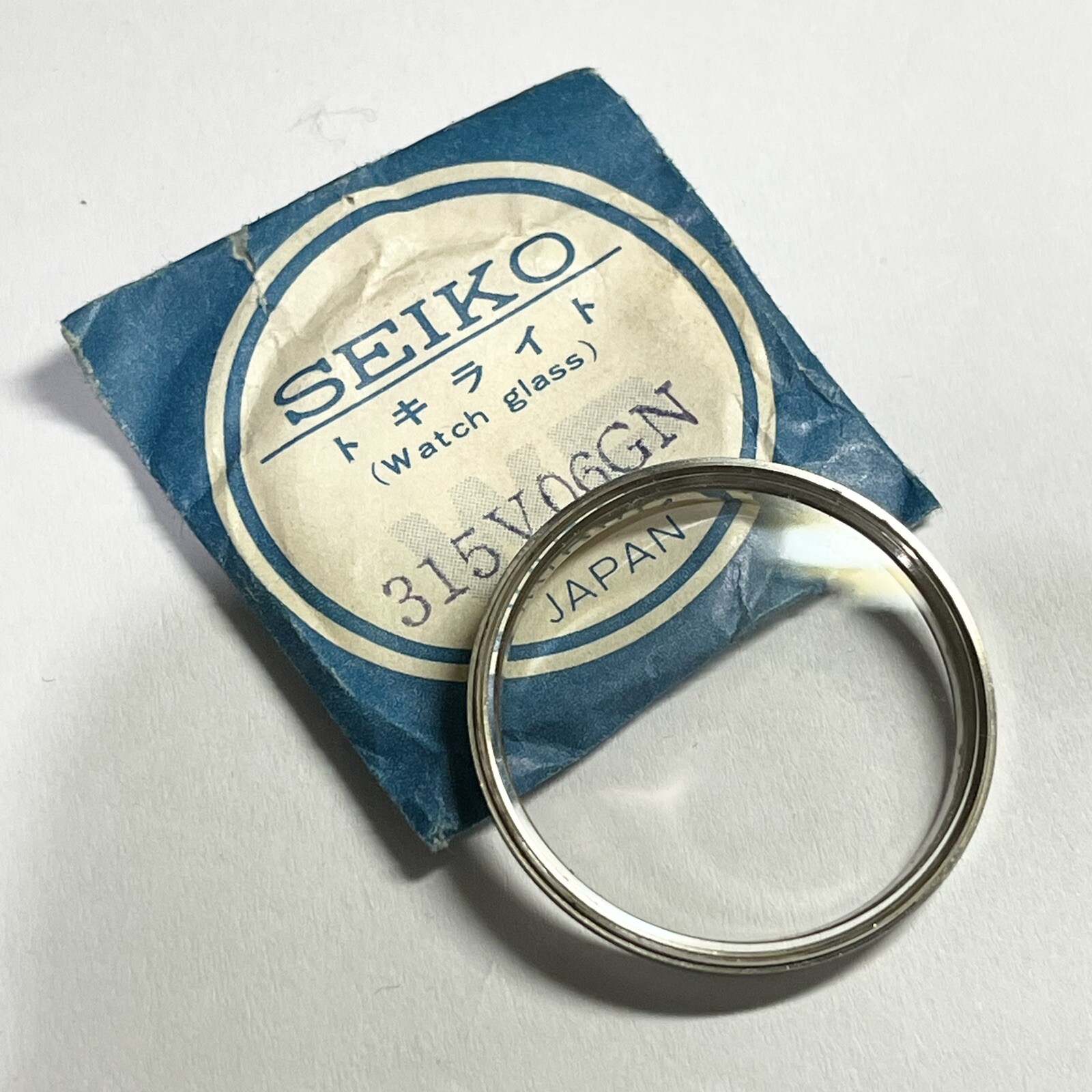 NOS GENUINE GLASS CRYSTAL SEIKO 5606-9030 5606-9040 LM Lord Matic 315V06GN