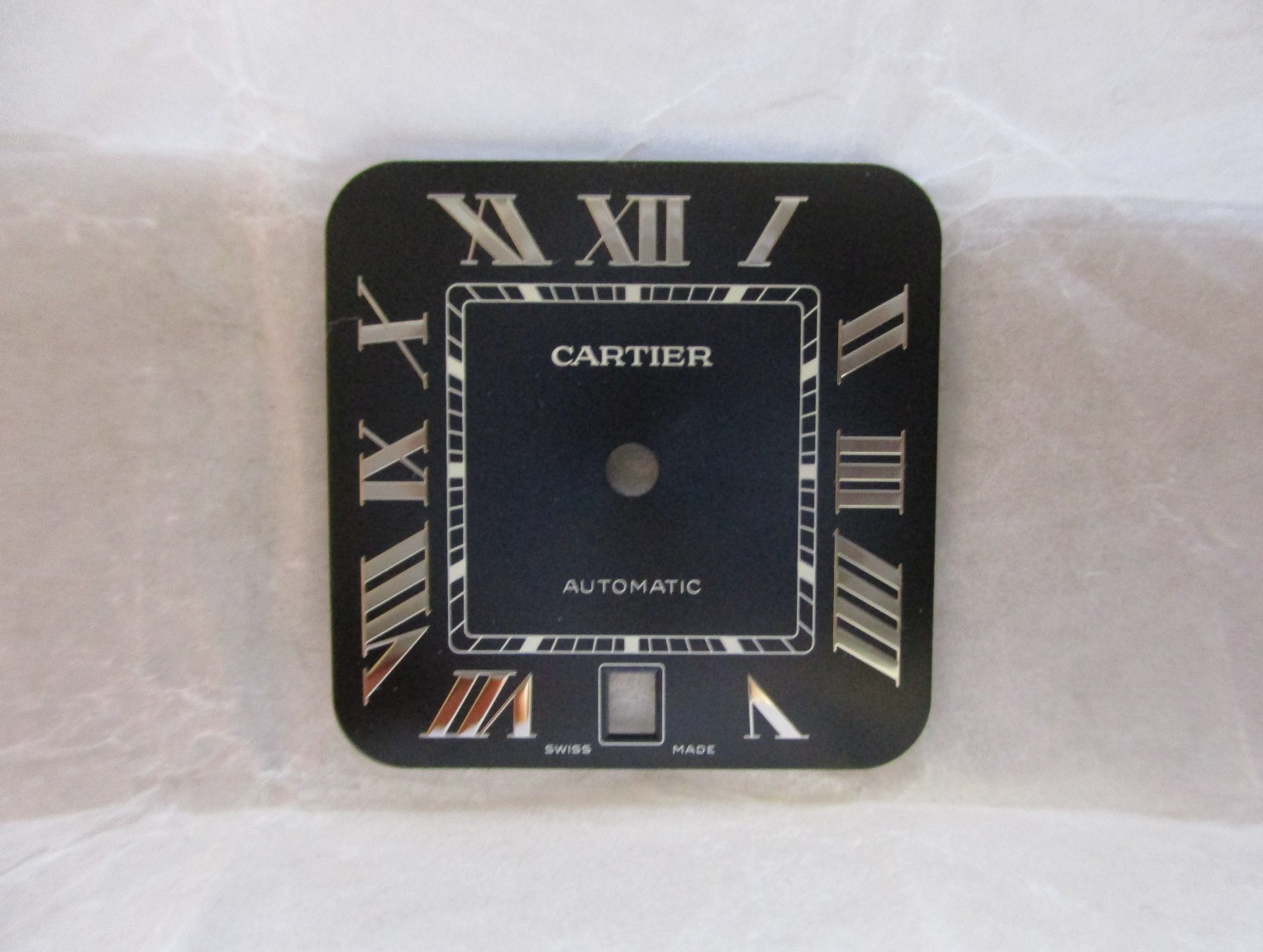 Cartier Santos White Dial Blue Roman 40mm Men’s Automatic Steel (Ref. WSSA0071?)