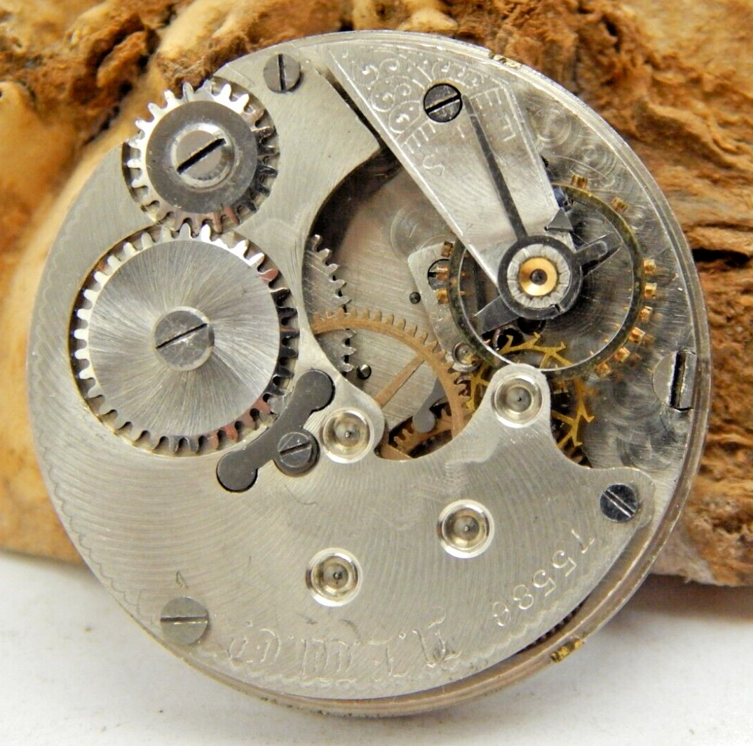 Antique Pocket Watch Movement New England 0 size open face with dial and hands