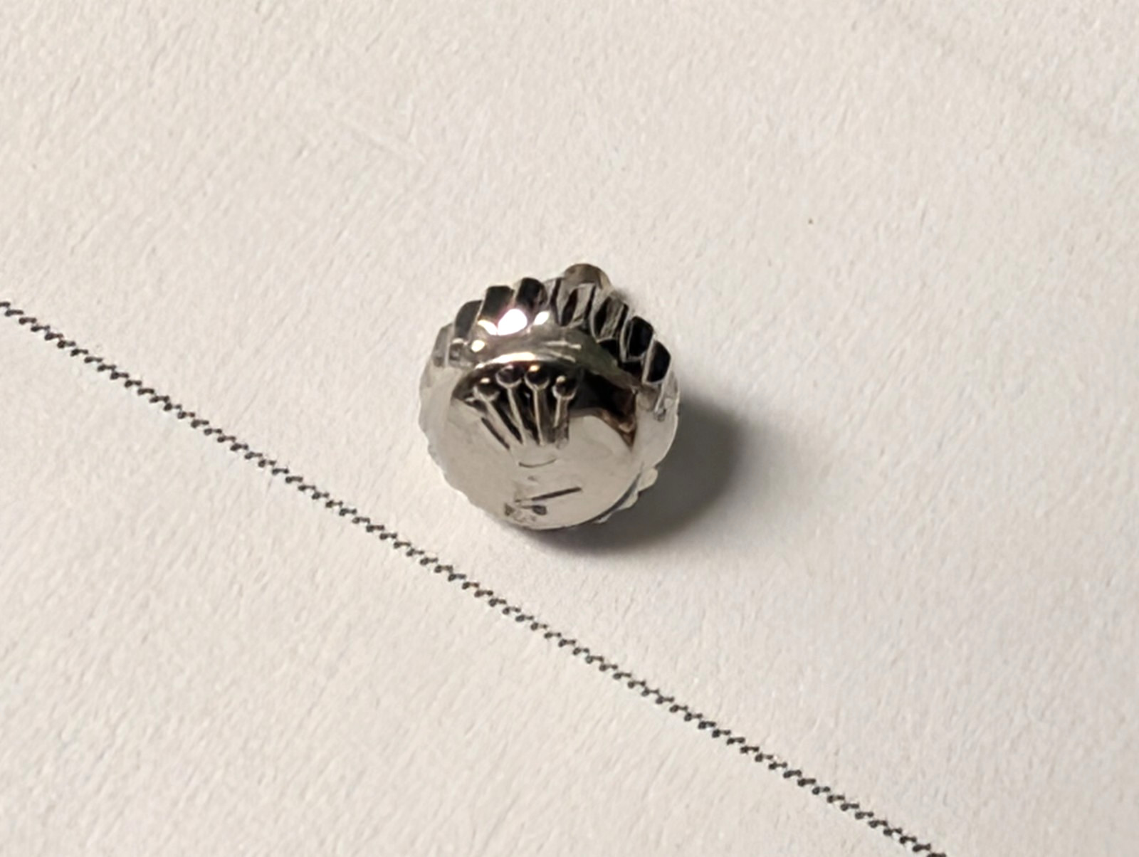 Genuine Rolex crown s/s 5.3mm with damage to face, but works