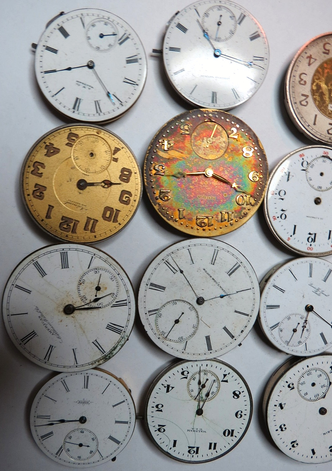 ANTIQUE LOT 16 DIFFERNT NAMES & SIZES POCKET WATCH MOVEMENT SELLING AS IS PARTS