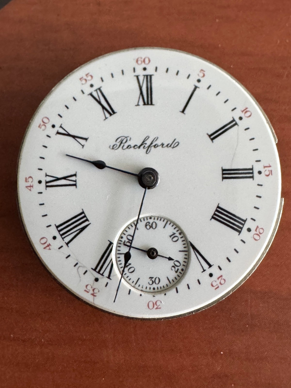 VINTAGE 0 SIZE ROCKFORD POCKET WATCH MOVEMENT GR. 180 RUNS HANDS DO NOT MOVE