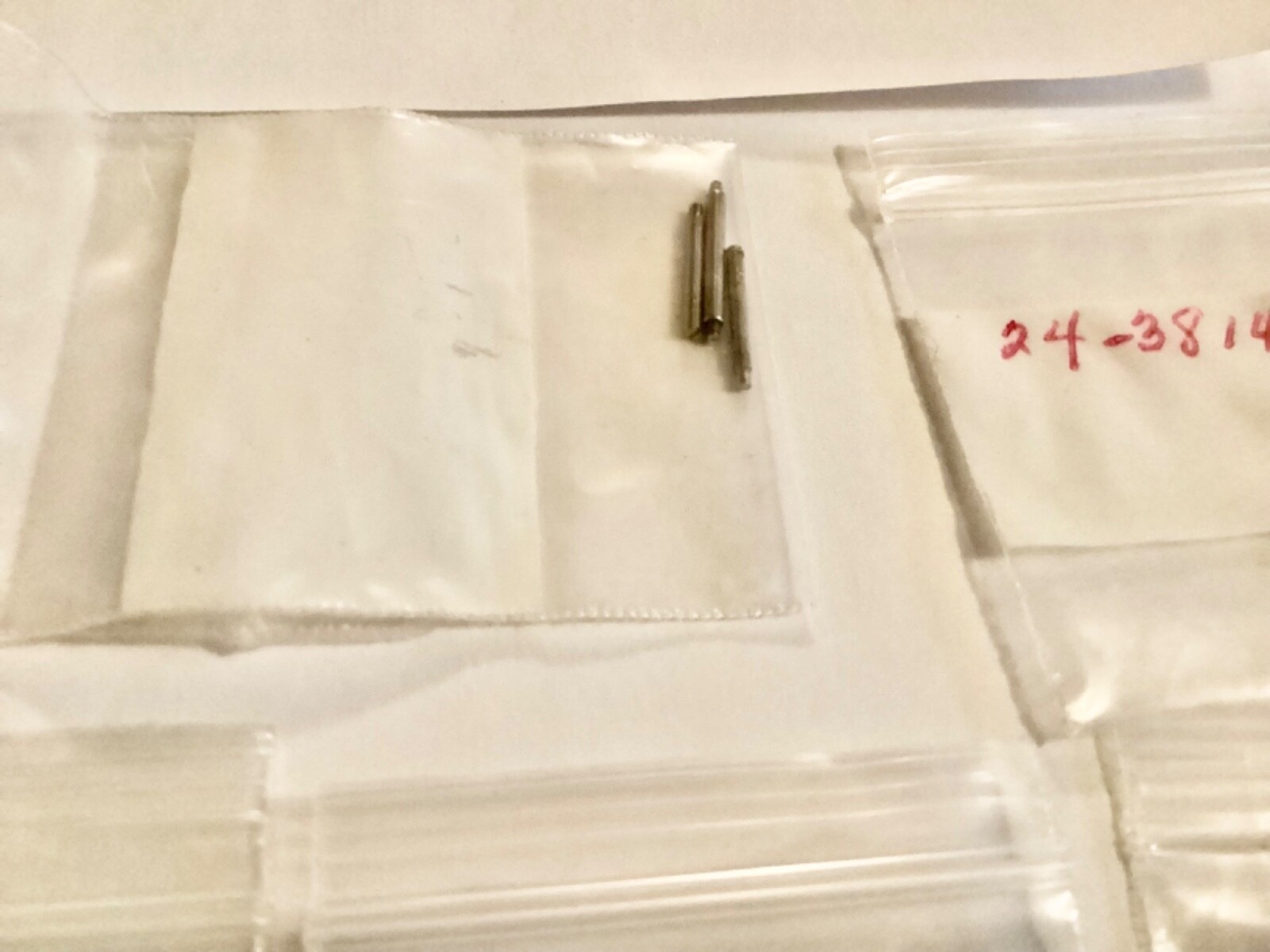 watch band pins unkown parts some with numbers