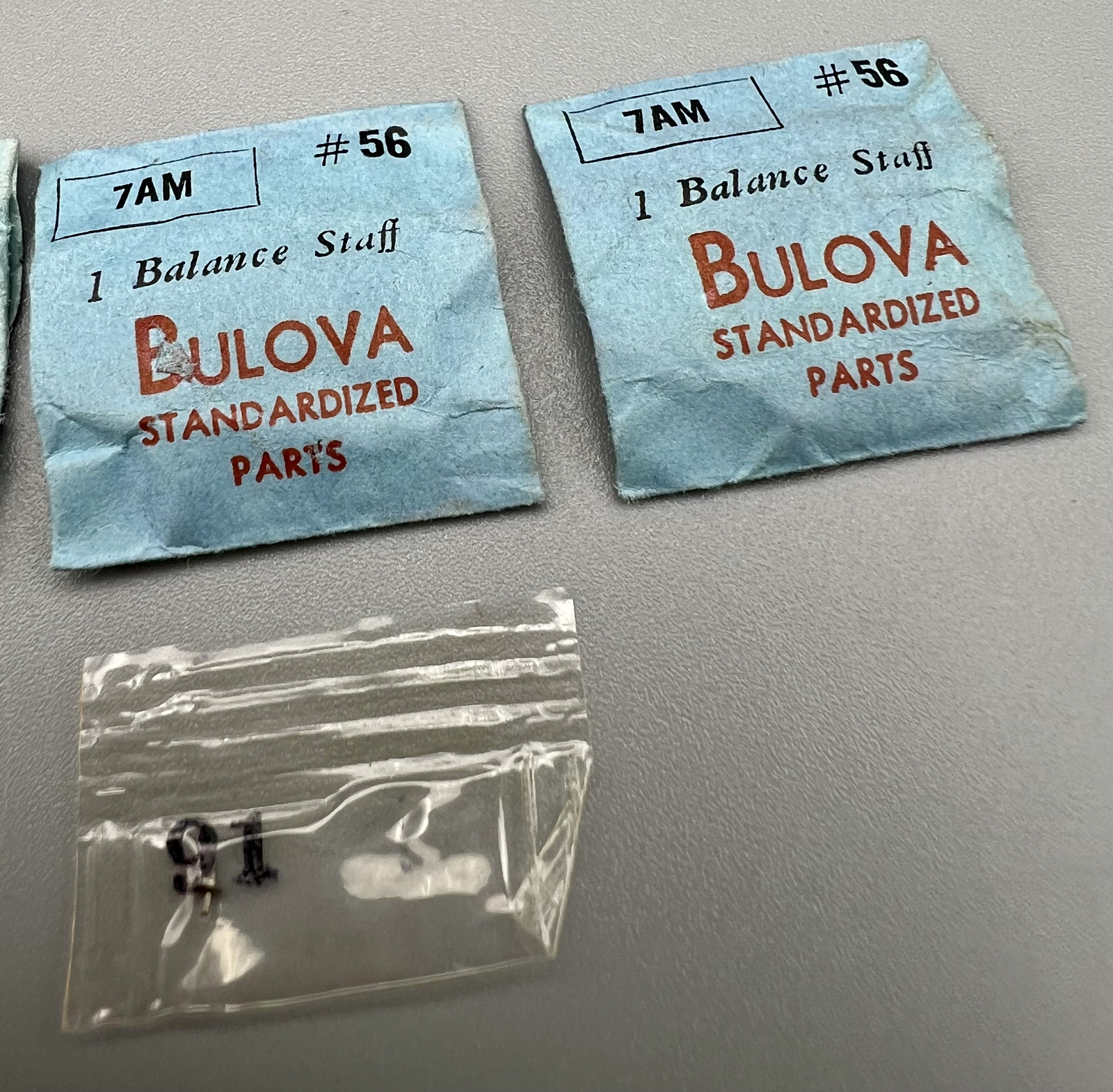 Lot 4 – BULOVA 7AM BALANCE STAFF #56 SWISS WATCH PARTS Factory Sealed NOS LOT H2