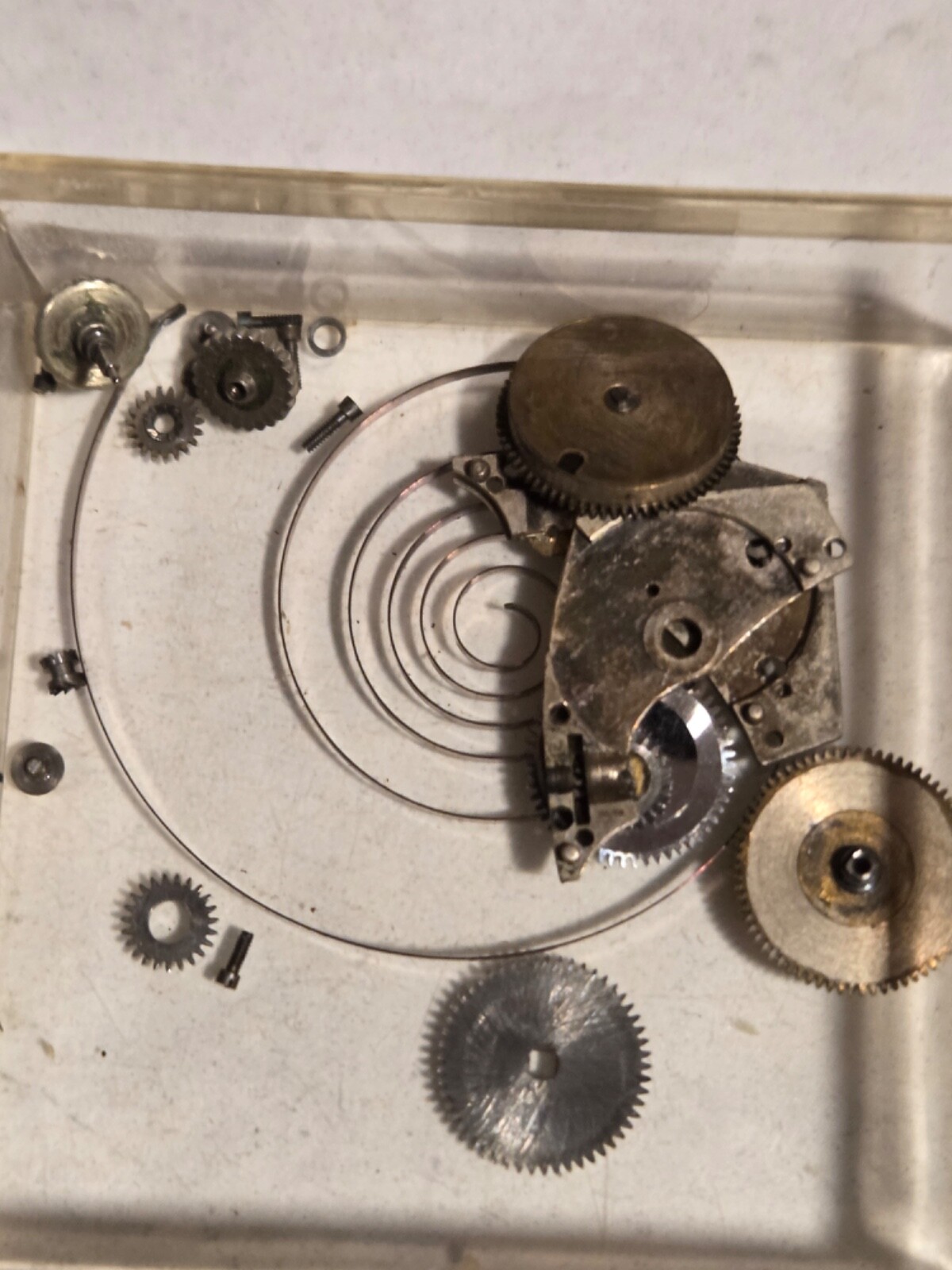 Two (2) A.Michel 640 movements. Partially disassembled, with parts.