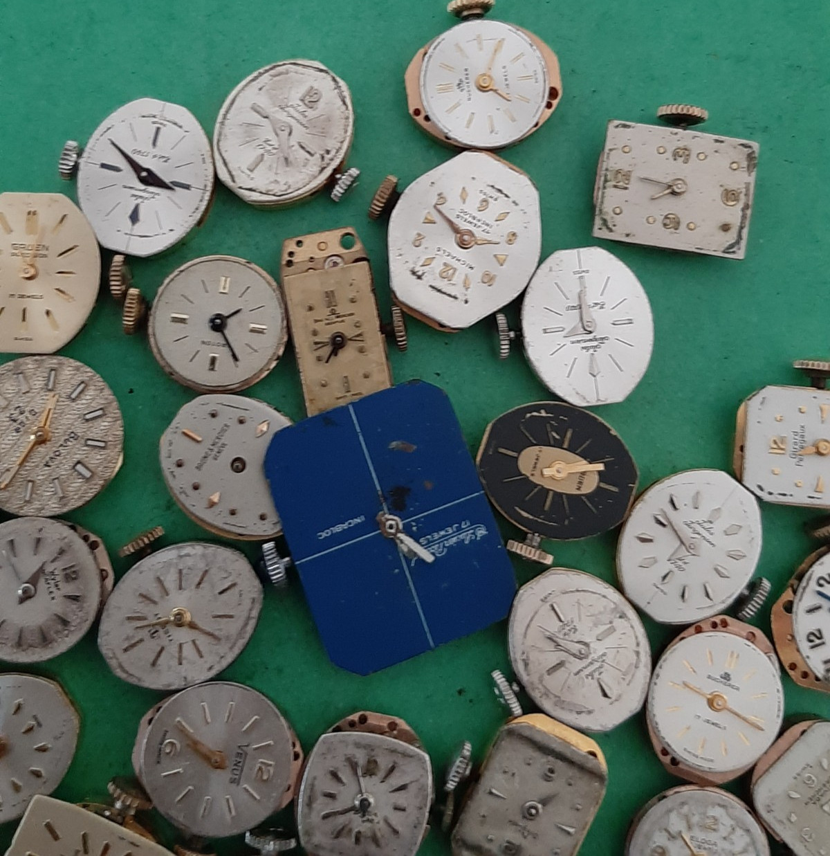 Lot of 60 Mechanical Wrist Watch Movements Parts Repair Manual Gold Cooper Tone
