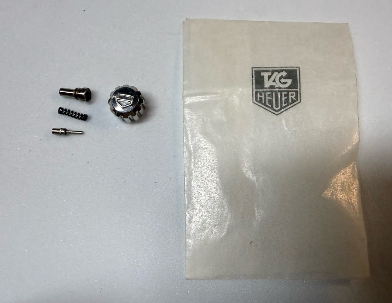 Tag Heuer Watch Crown And Parts, Marked KY 1218, 6.61mm x 5.12mm Parts Or Repair